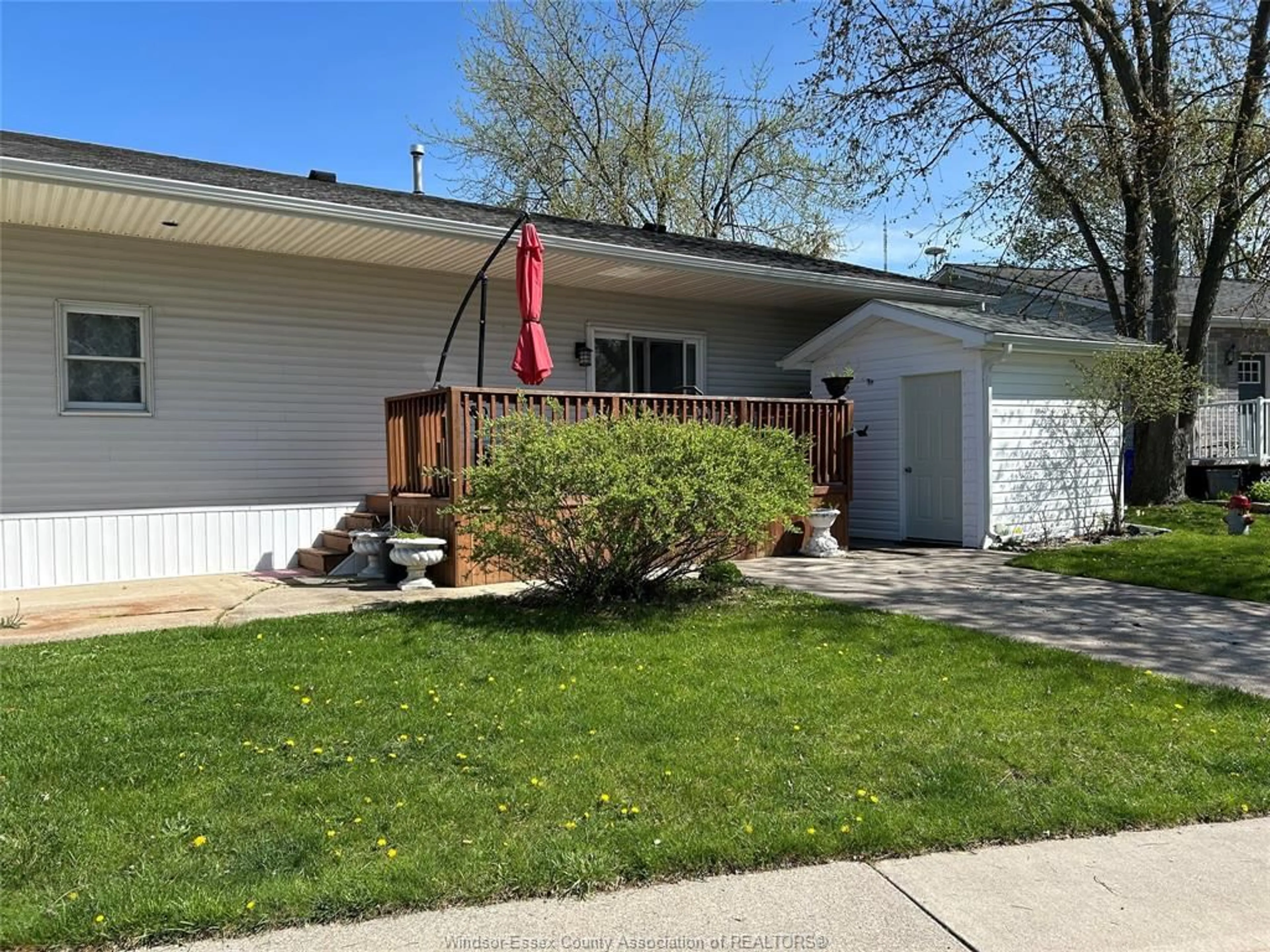 Home with vinyl exterior material, street for 27 SPRUCE, McGregor Ontario N0R 1J0