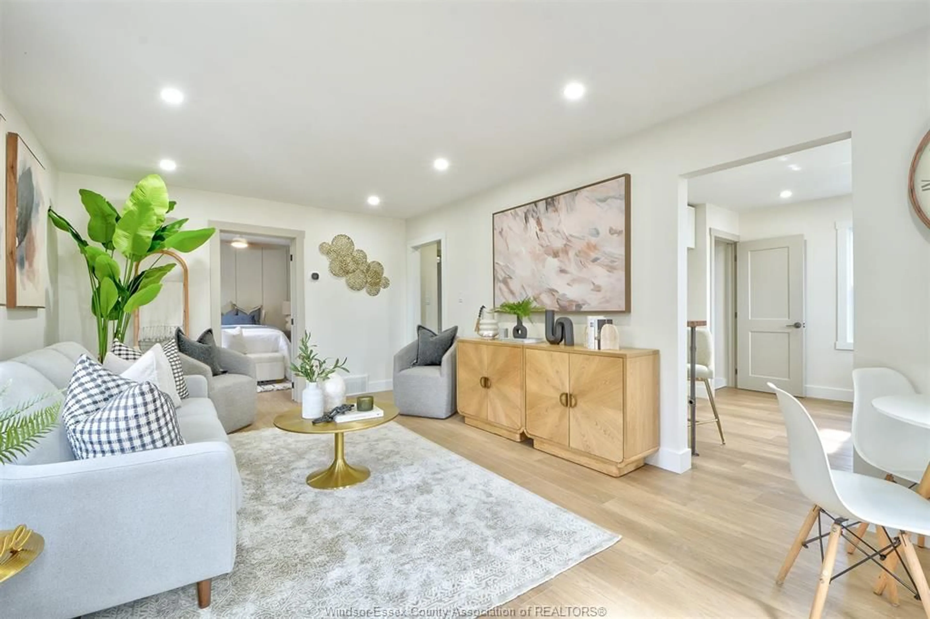 Living room with furniture, wood/laminate floor for 2658 MELDRUM, Windsor Ontario N8W 4G2