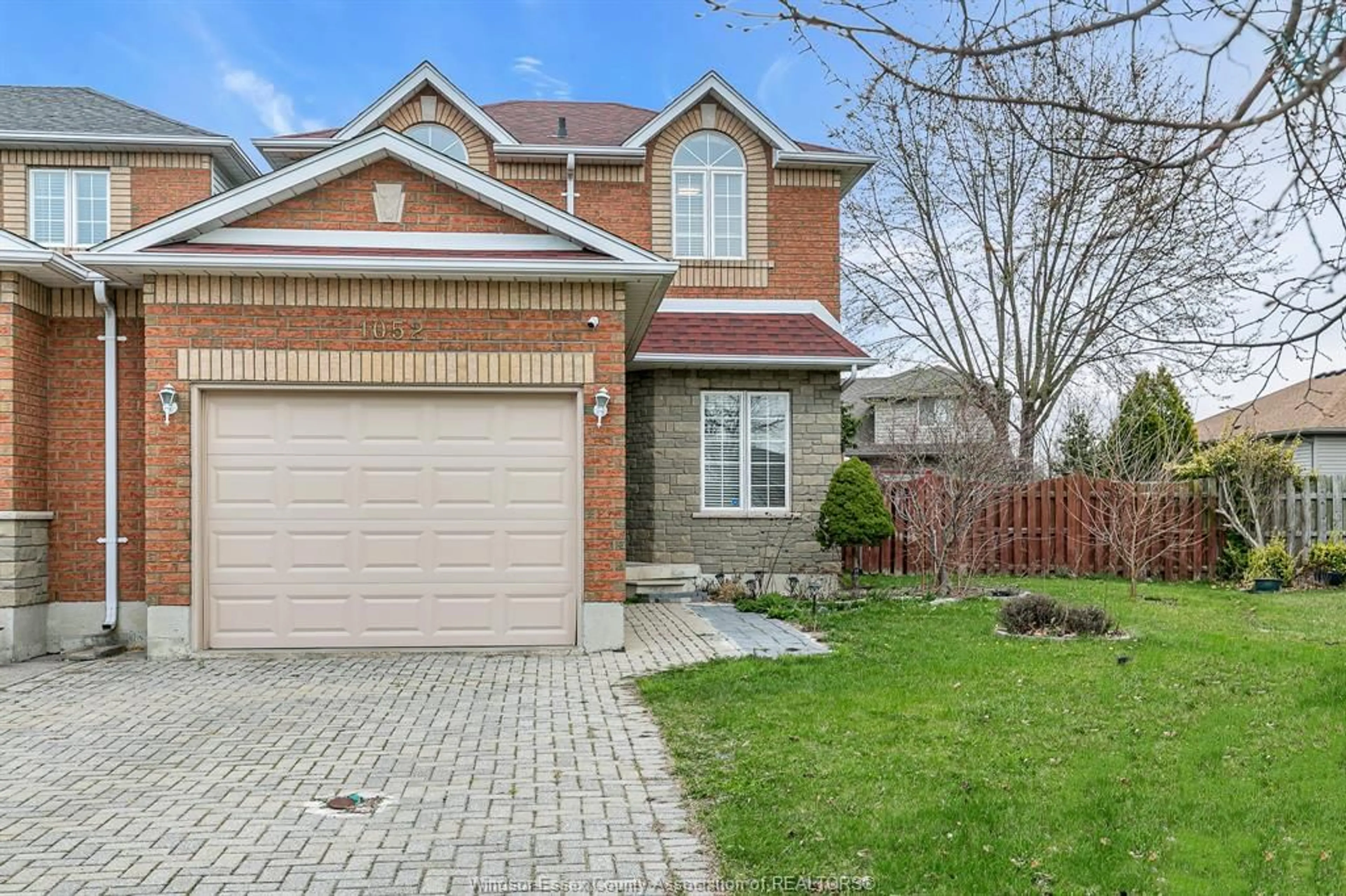 Home with brick exterior material, street for 1052 LEMONWOOD Cres, Windsor Ontario N9G 2R8