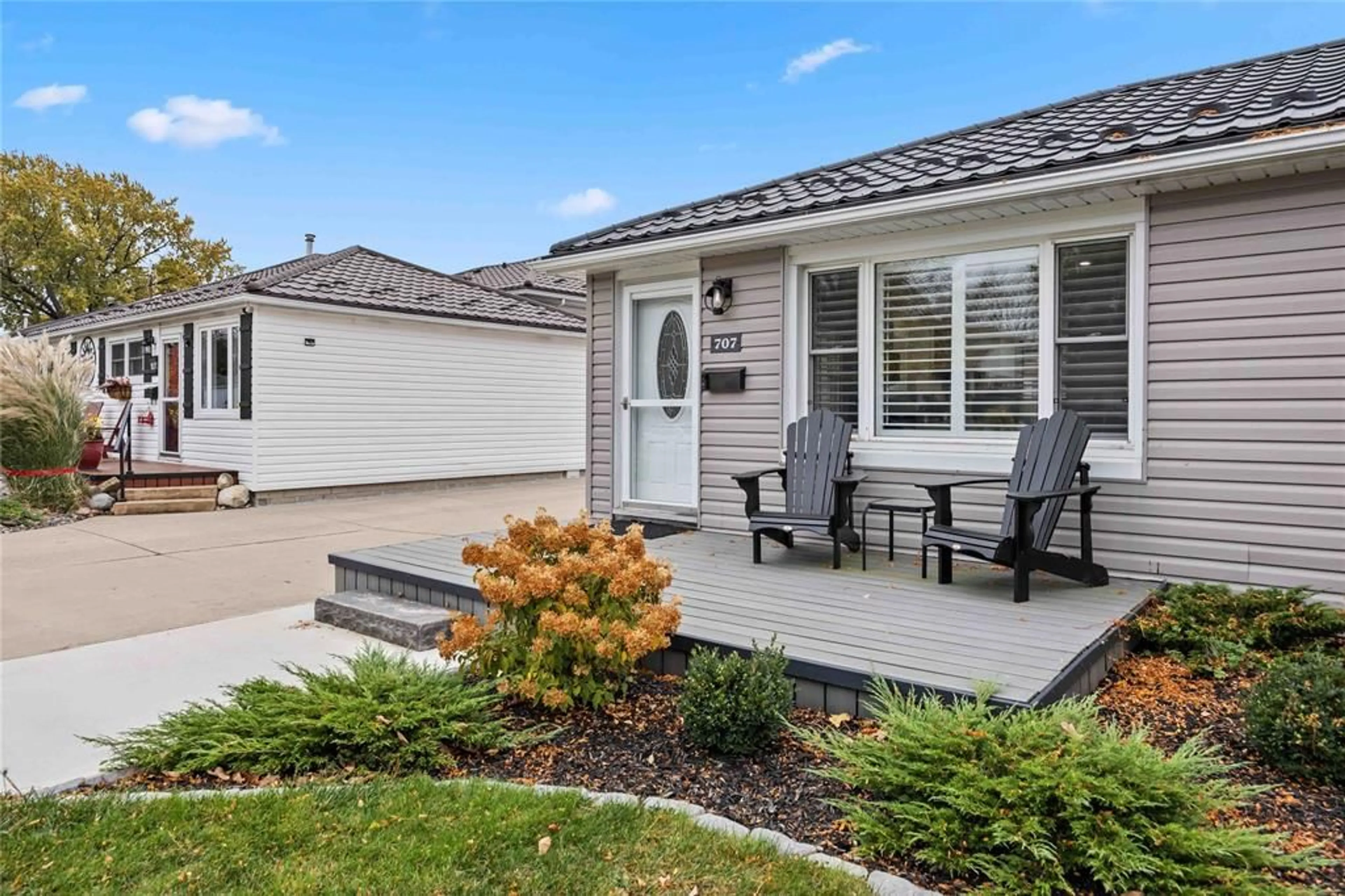 Home with vinyl exterior material, street for 707 CHARLES St, Point Edward Ontario N7V 1C1