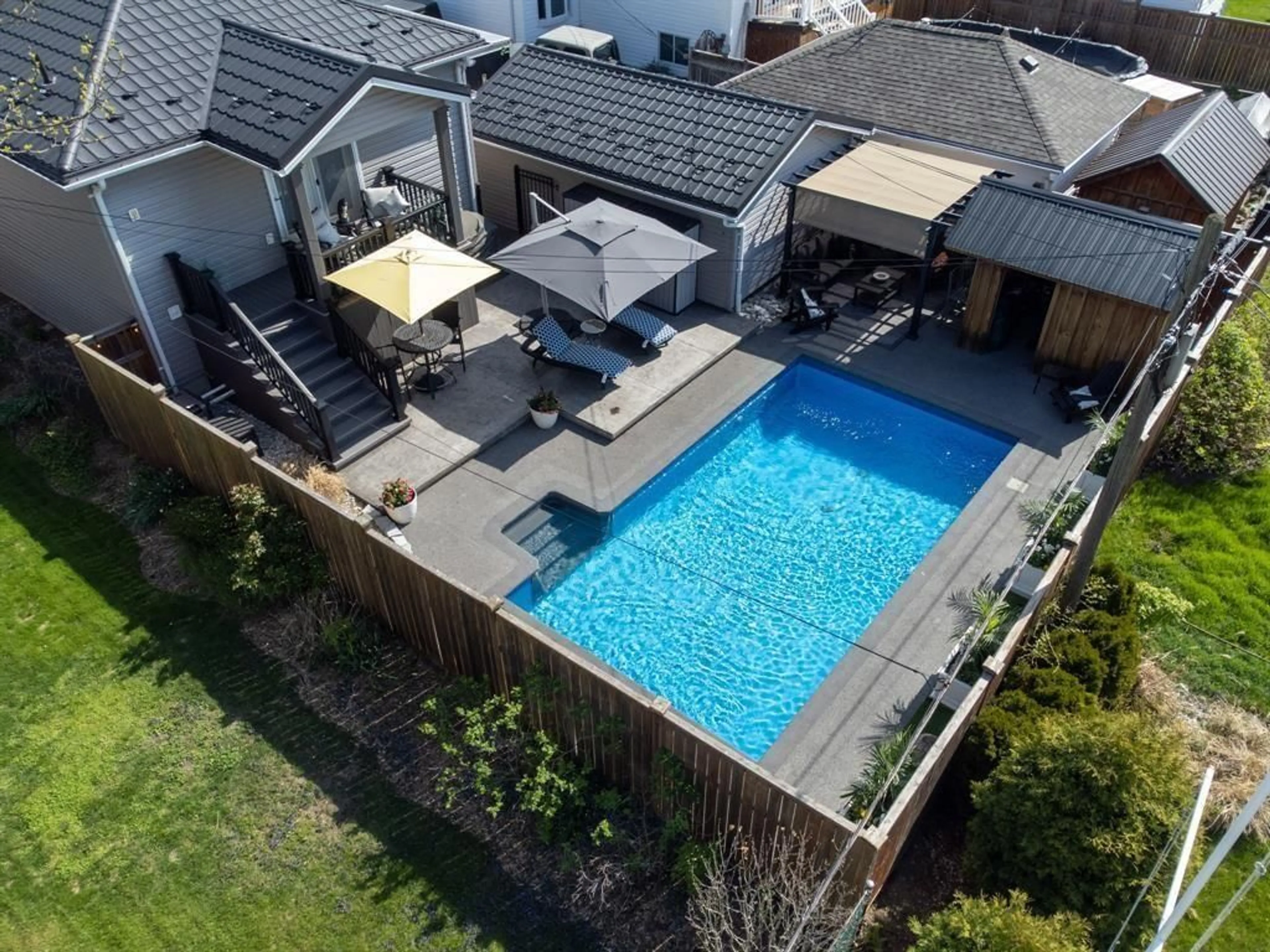A pic from outside/outdoor area/front of a property/back of a property/a pic from drone, unknown for 707 CHARLES St, Point Edward Ontario N7V 1C1