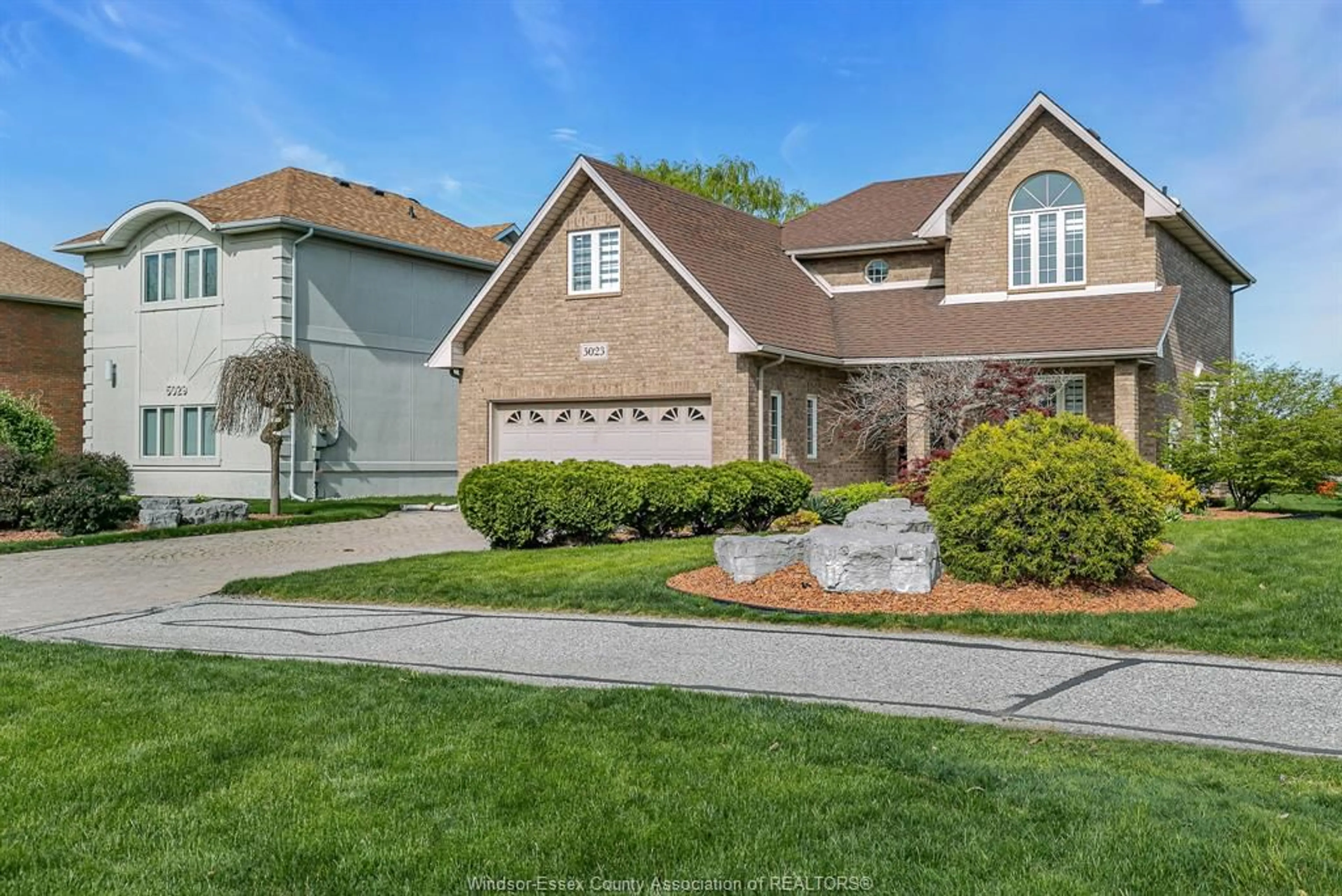 Home with brick exterior material, street for 5023 SOUTHWOOD LAKES, Windsor Ontario N9G 2Y1