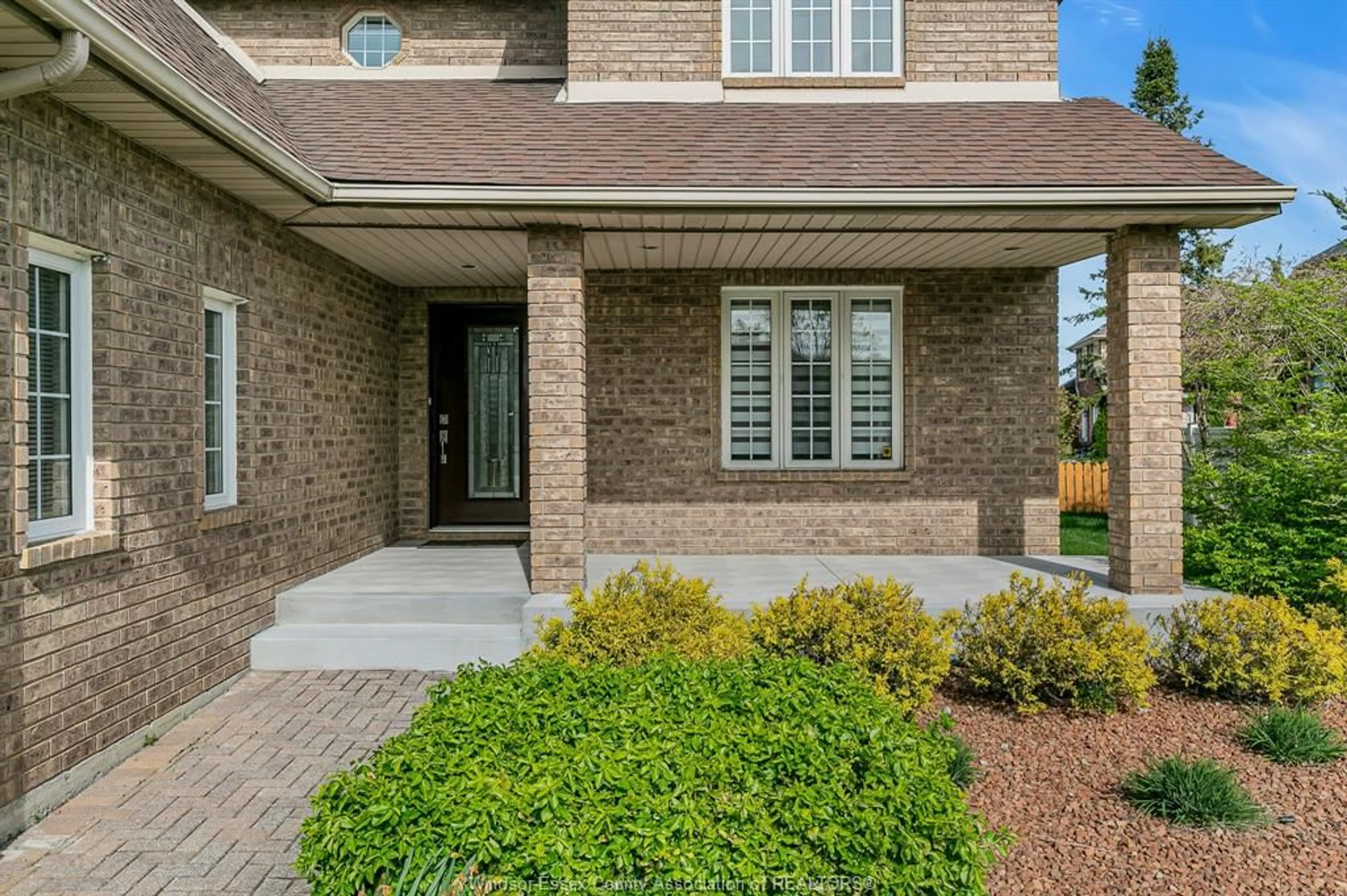 Home with brick exterior material, street for 5023 SOUTHWOOD LAKES, Windsor Ontario N9G 2Y1