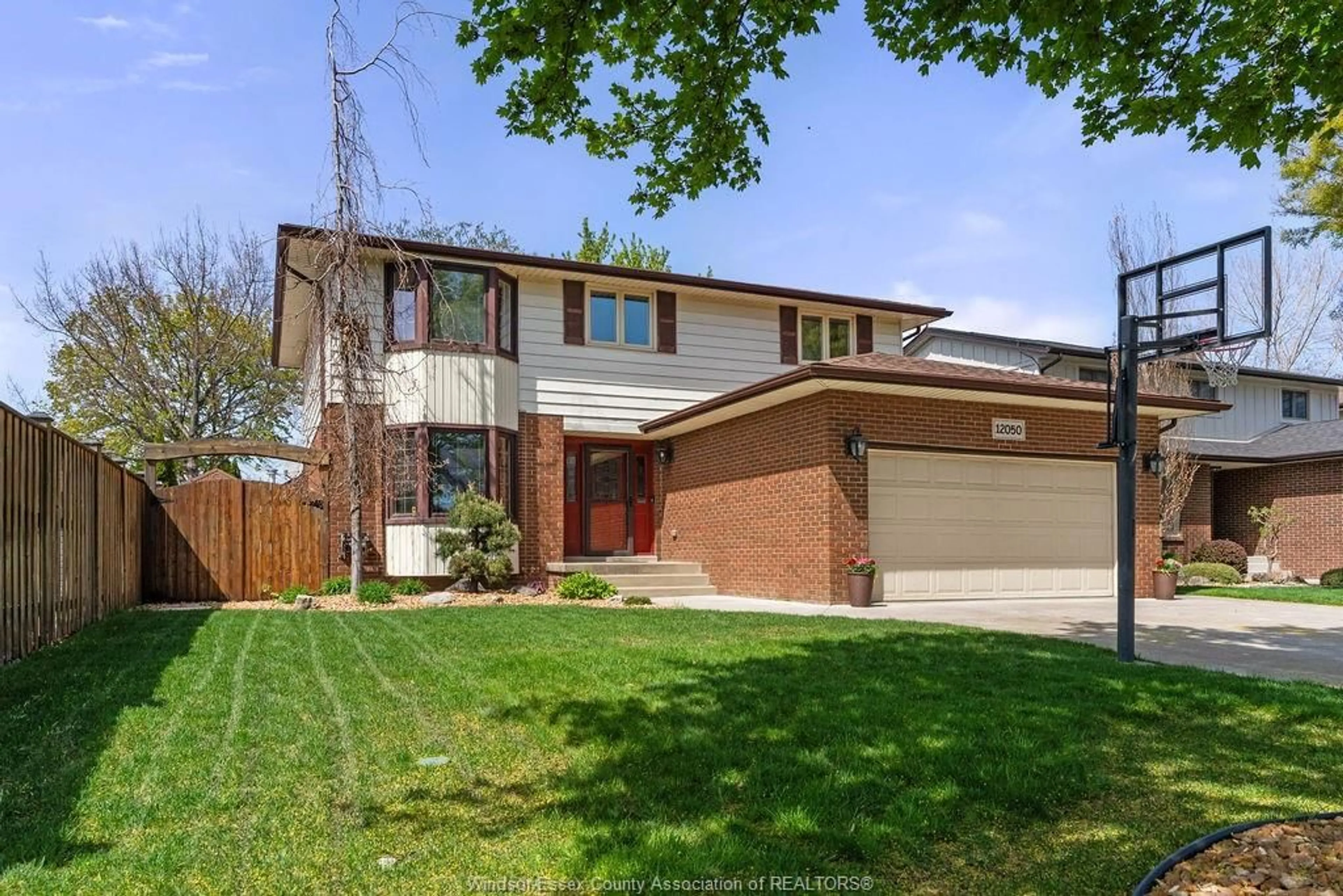 Home with brick exterior material, street for 12050 APPLETREE Cres, Tecumseh Ontario N8N 4A5