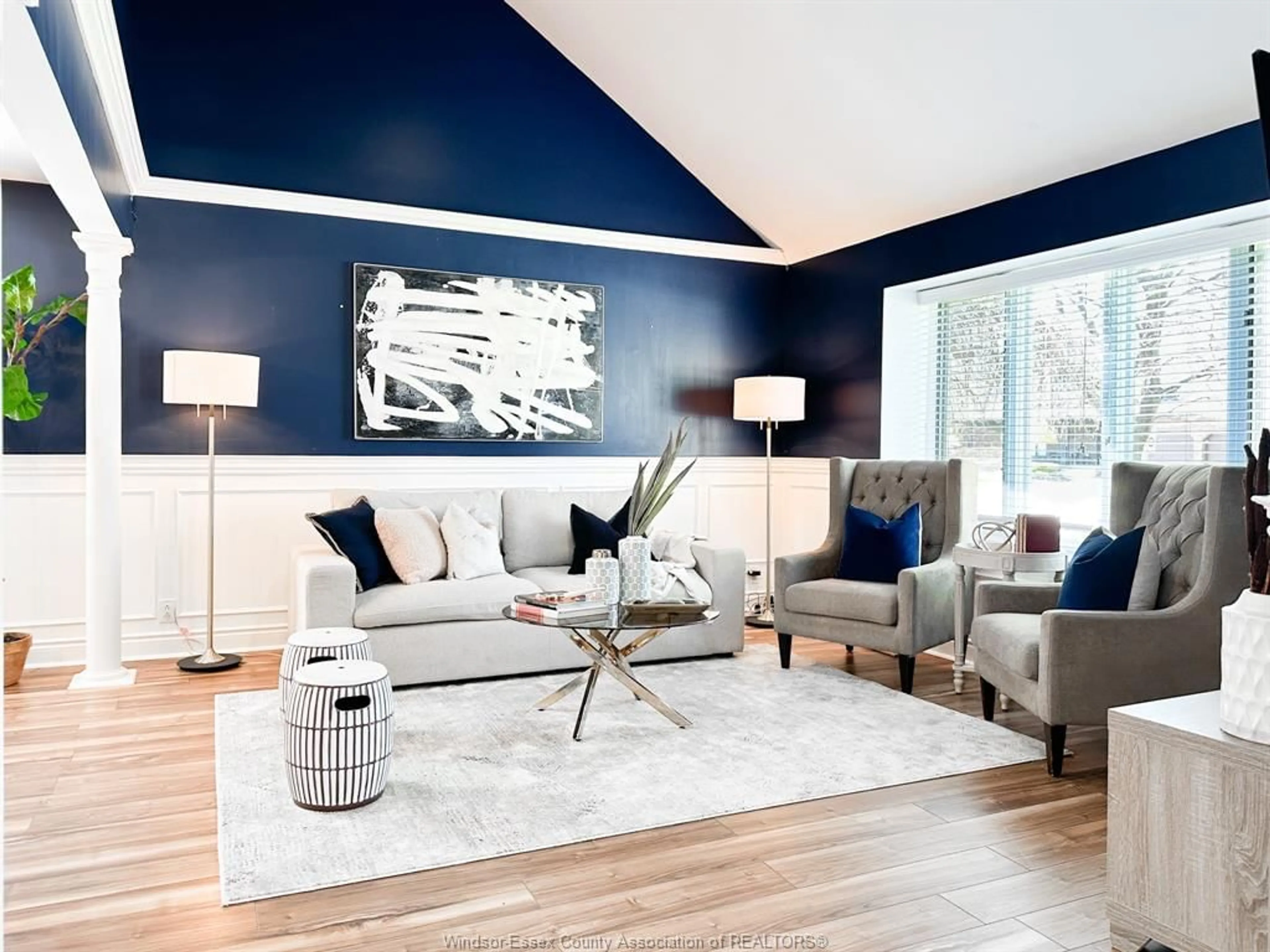 Living room with furniture, wood/laminate floor for 106 MARENTETTE, Tecumseh Ontario N0R 1A0