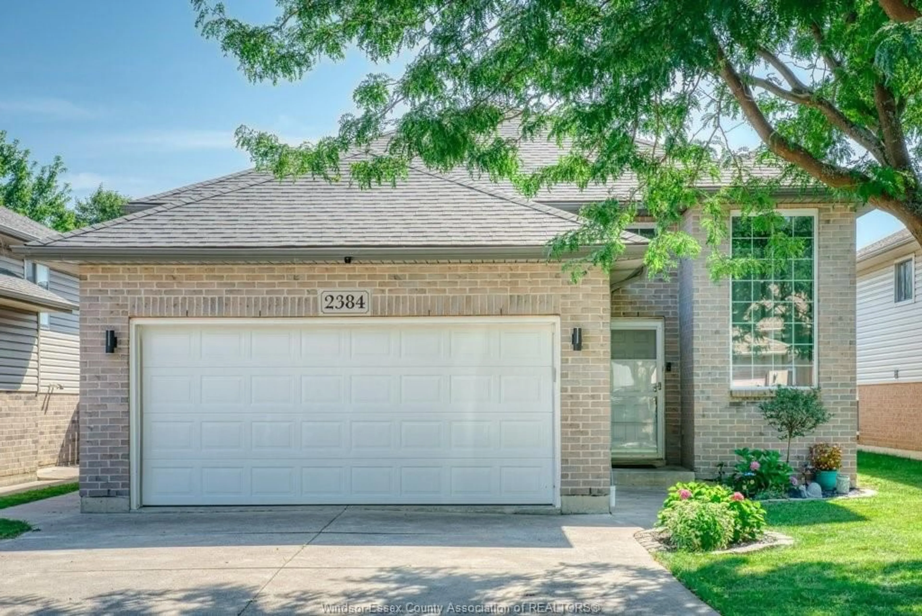 Home with brick exterior material, street for 2384 RADCLIFF Ave, Windsor Ontario N8P 1V5