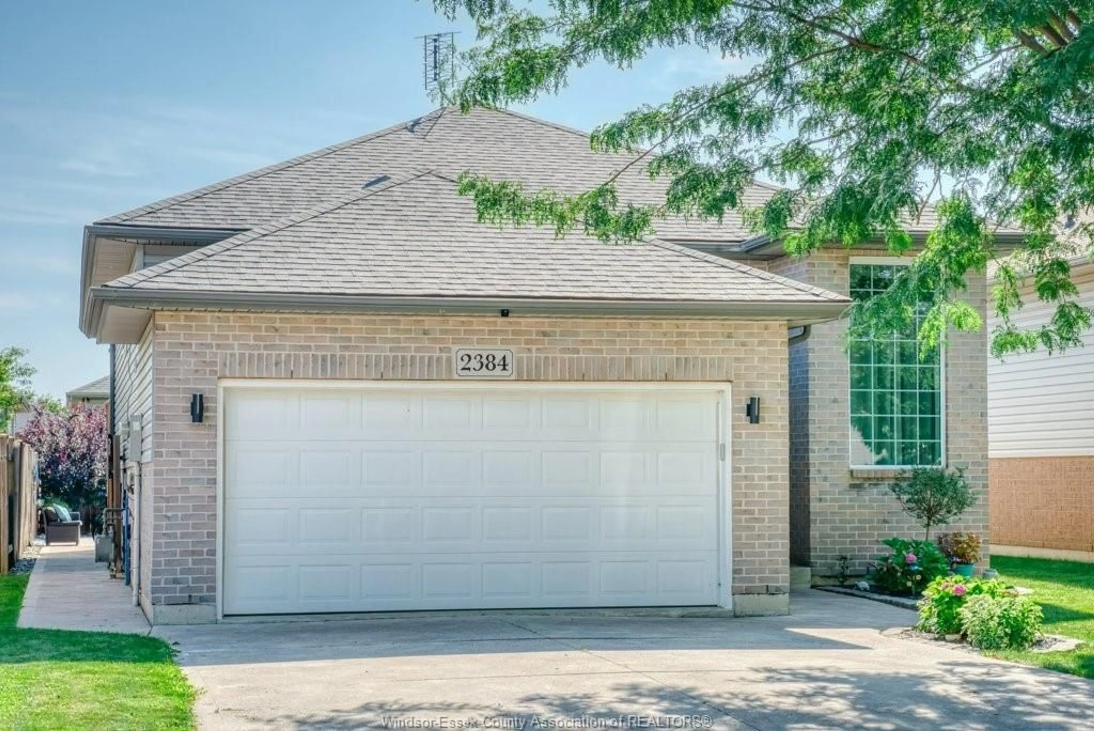 Home with brick exterior material, street for 2384 RADCLIFF Ave, Windsor Ontario N8P 1V5