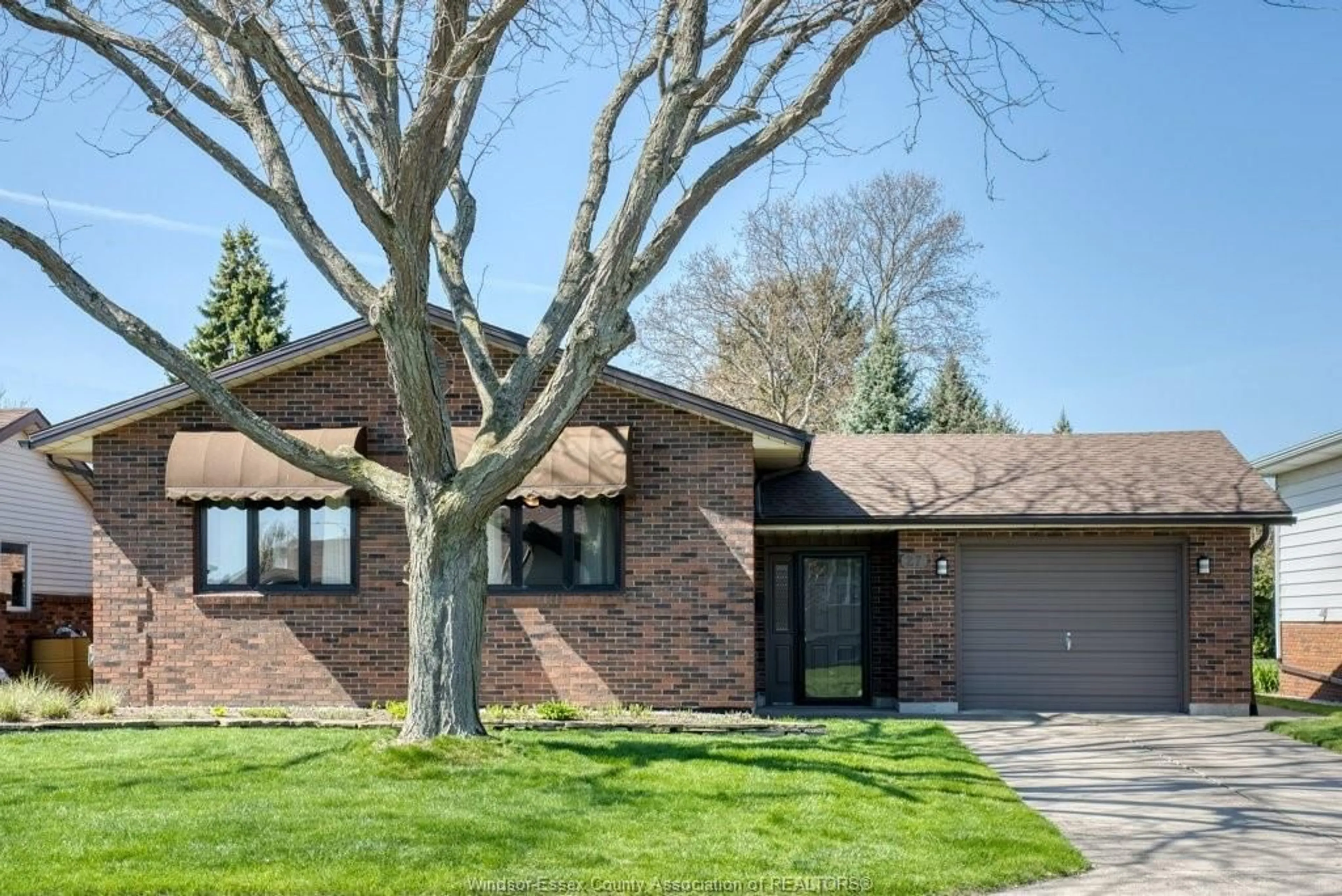 Home with brick exterior material, street for 27 BENNIE, Leamington Ontario N8H 4M1