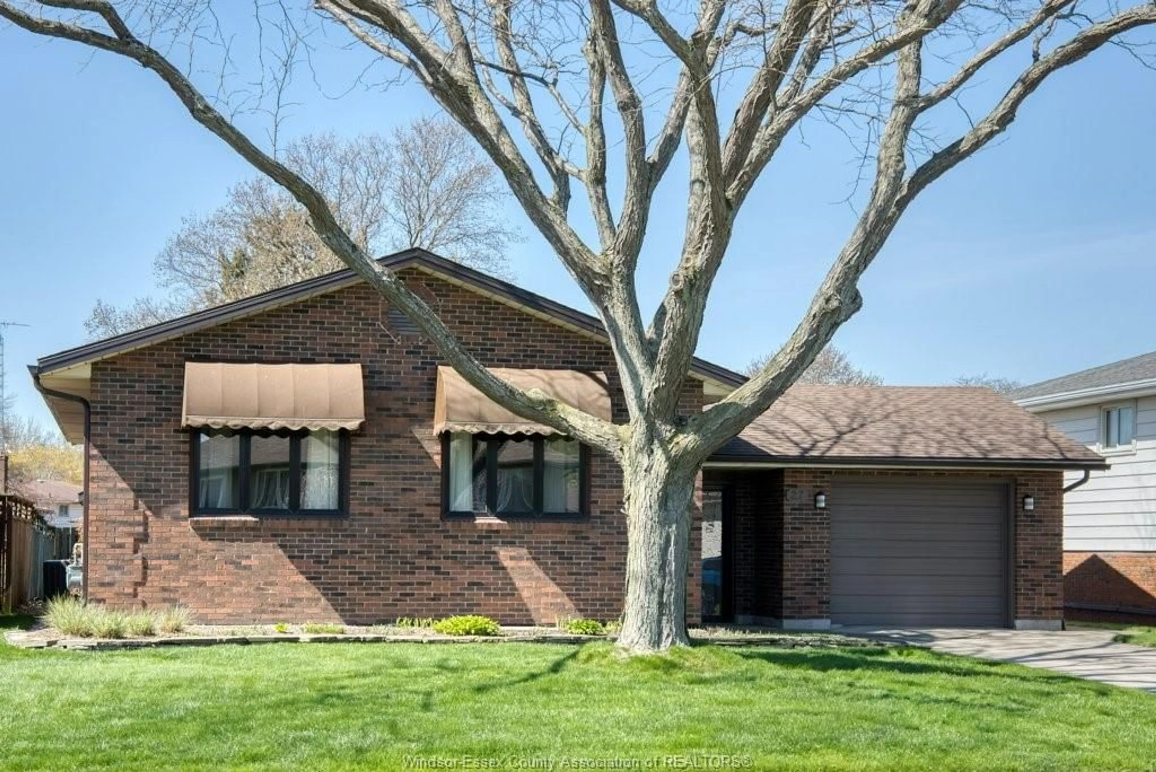 Home with brick exterior material, street for 27 BENNIE, Leamington Ontario N8H 4M1