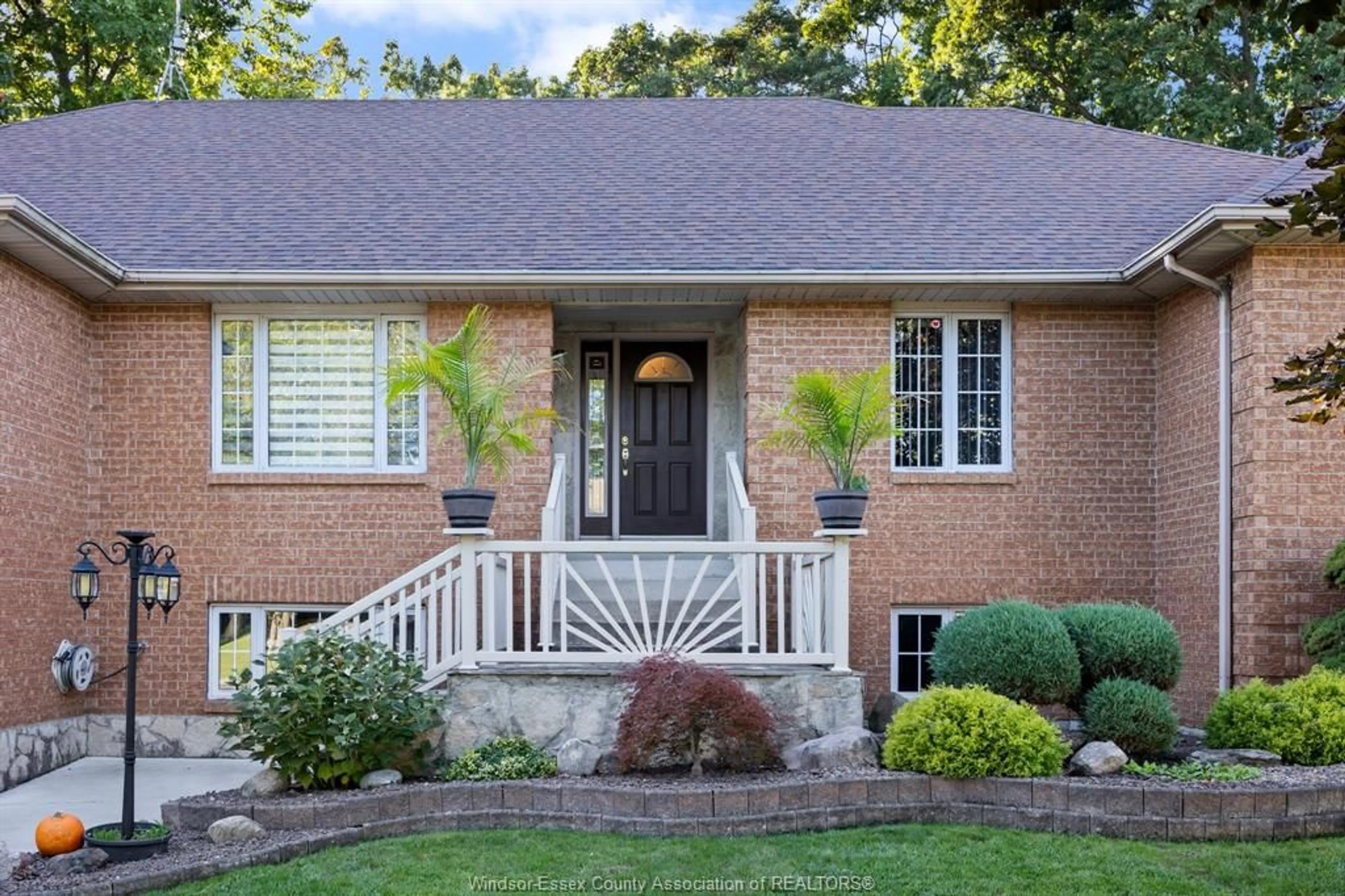 Home with brick exterior material, street for 217 WOODLAND Dr, Harrow Ontario N0R 1G0