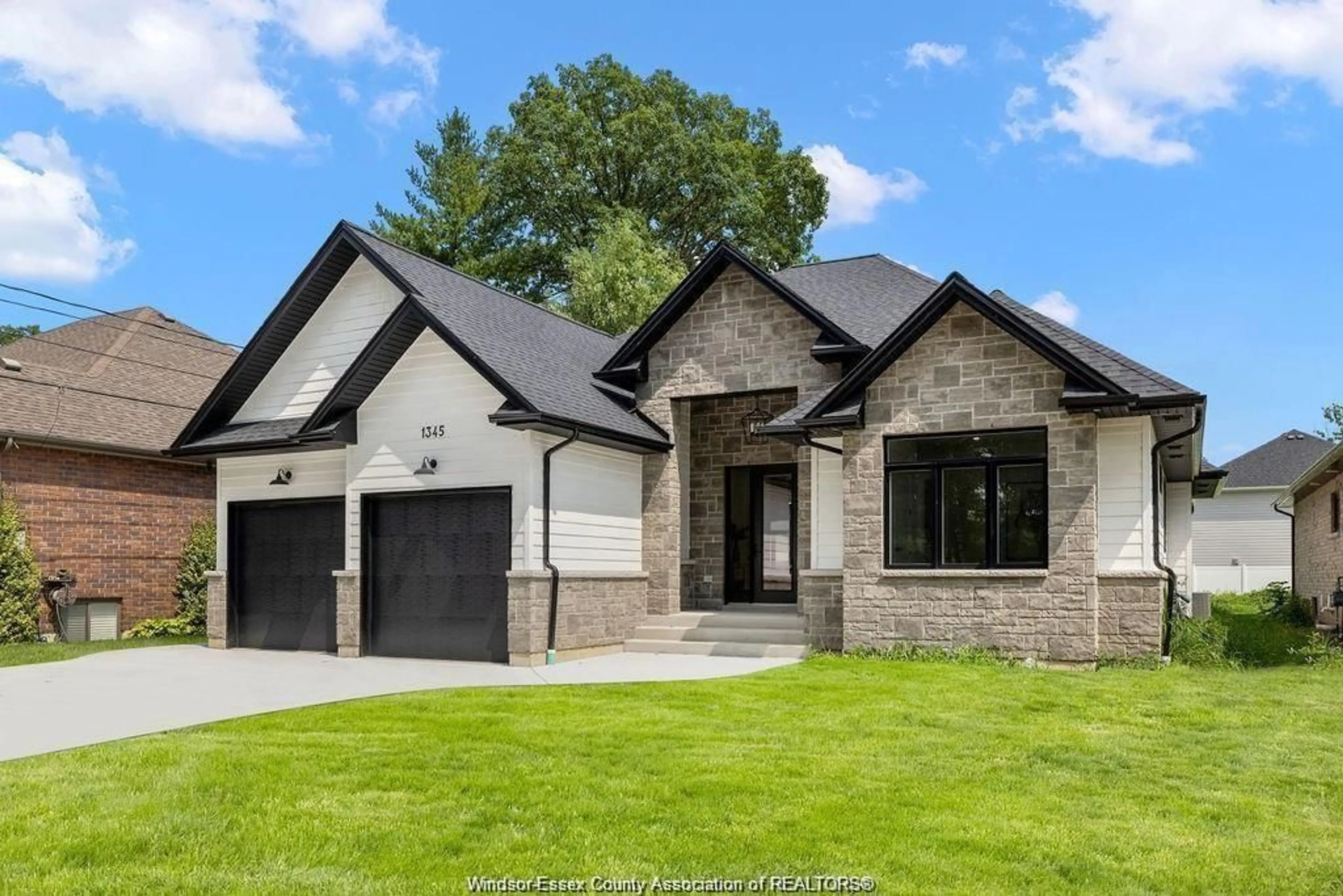 Home with brick exterior material, street for LOT 8 LASALLE WOODS Blvd, LaSalle Ontario N8H 0L6