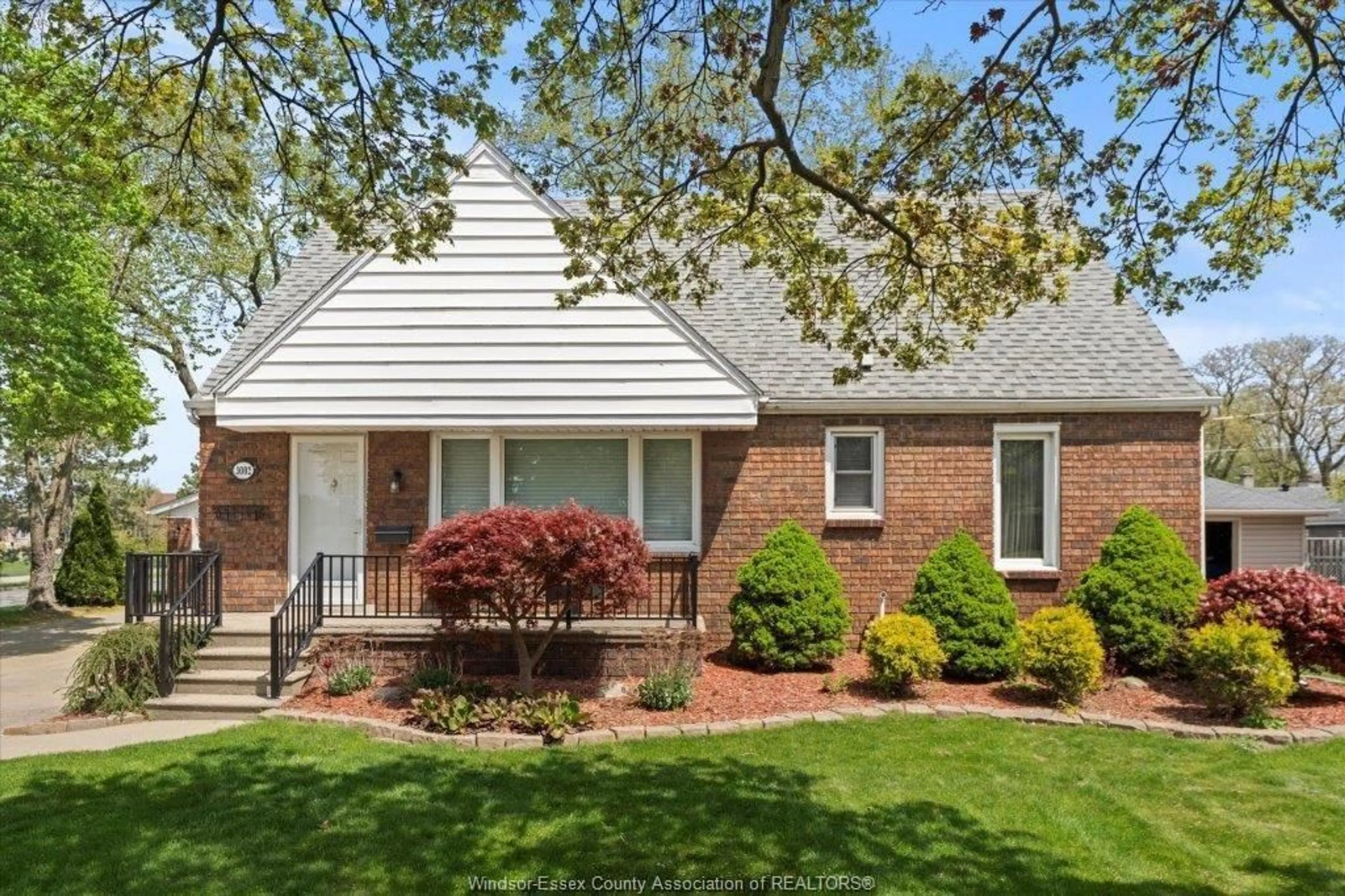 Home with brick exterior material, street for 3002 RADISSON, Windsor Ontario N9E 1Y5