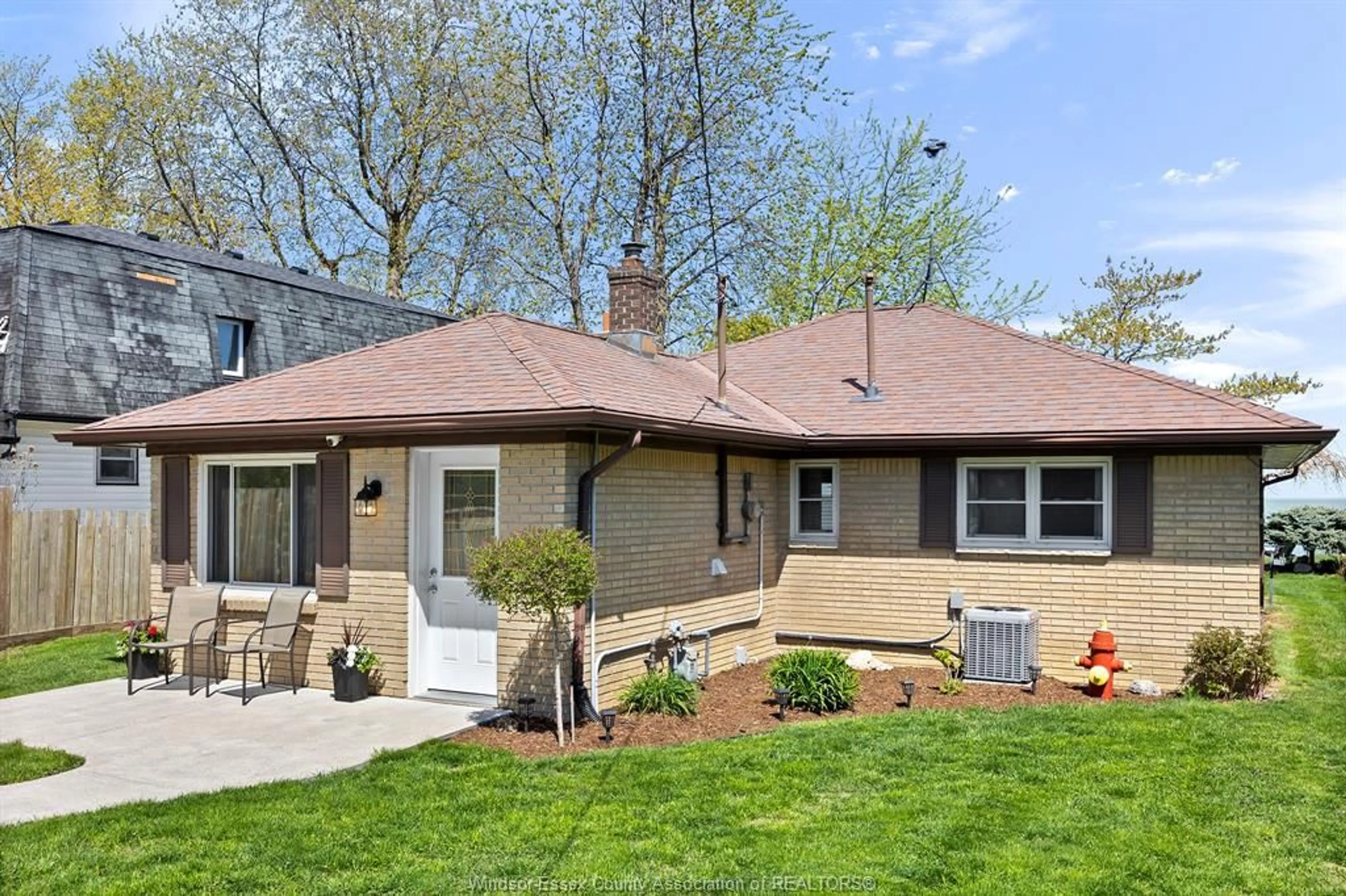 Home with brick exterior material, street for 451 CHARRON BEACH Rd, Lakeshore Ontario N8L 1J5