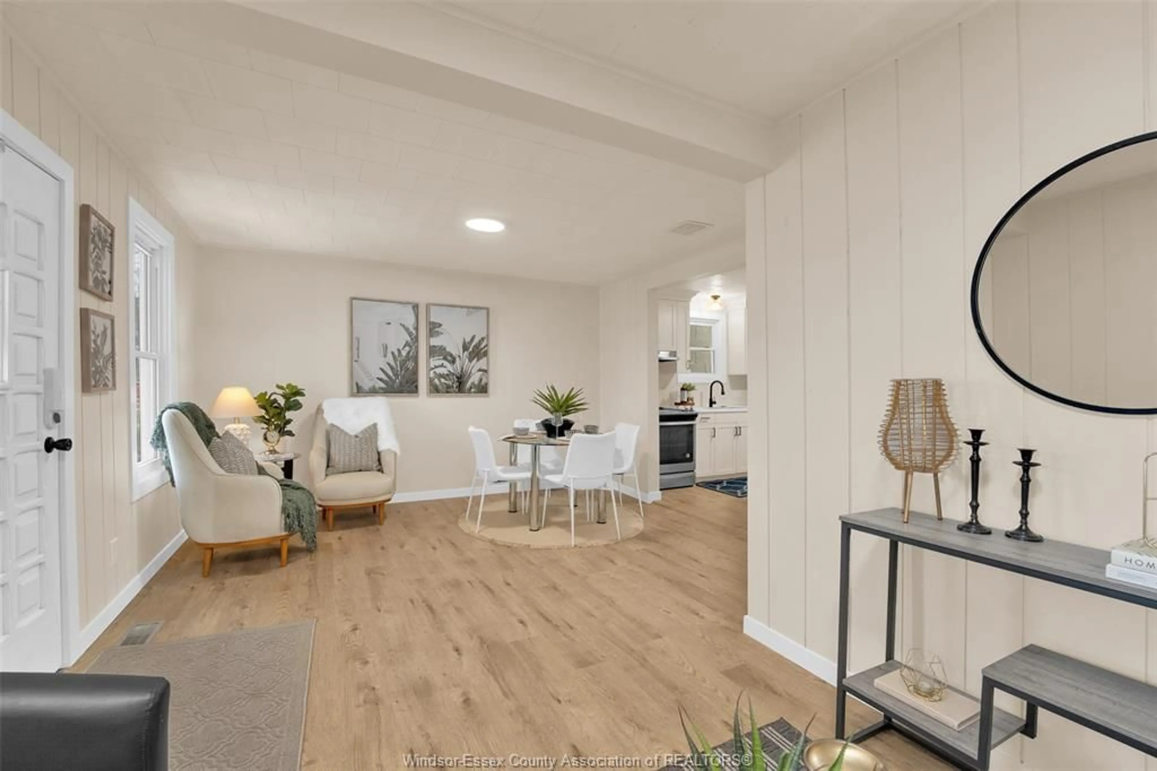 Living room with furniture, wood/laminate floor for 366 ST. CHARLES, Belle River Ontario N0R 1A0
