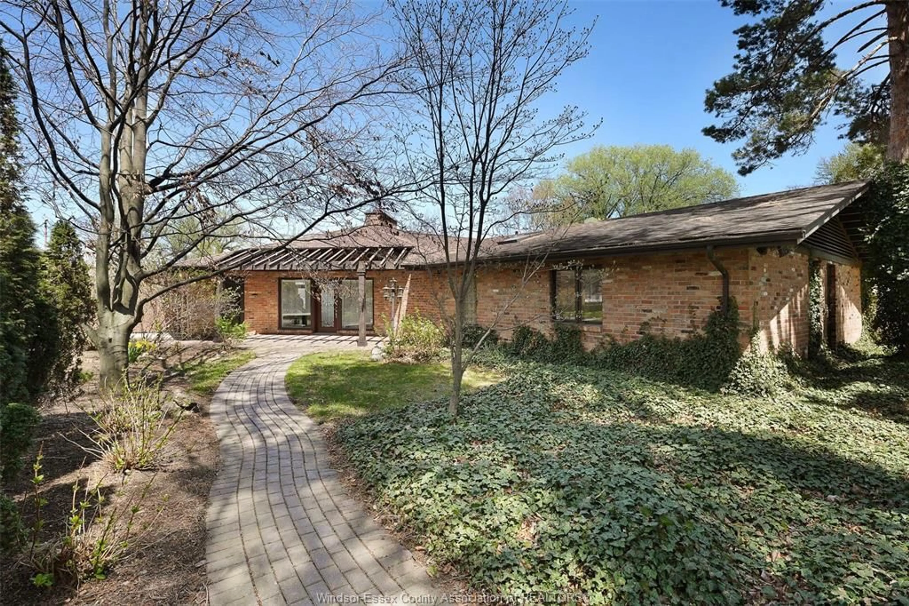 Home with brick exterior material, street for 6300 RIVERSIDE Dr, Windsor Ontario N8S 1B9