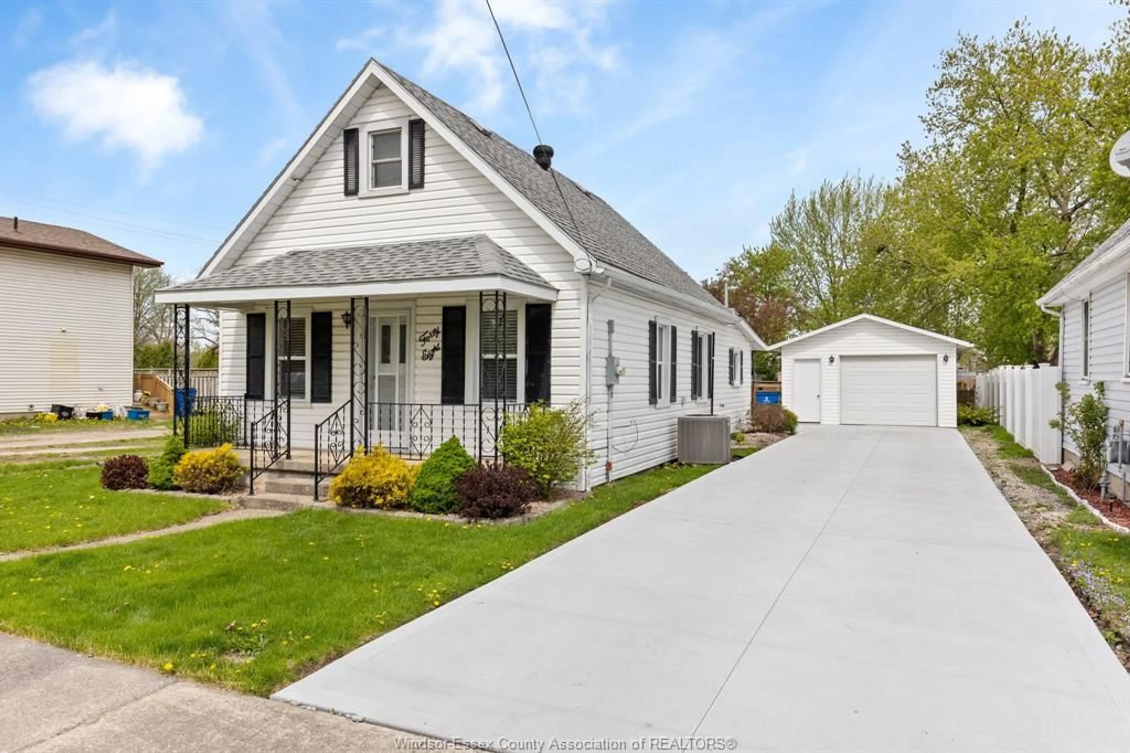 Home with vinyl exterior material, street for 48 CANAL St, Tilbury Ontario N0P 2L0