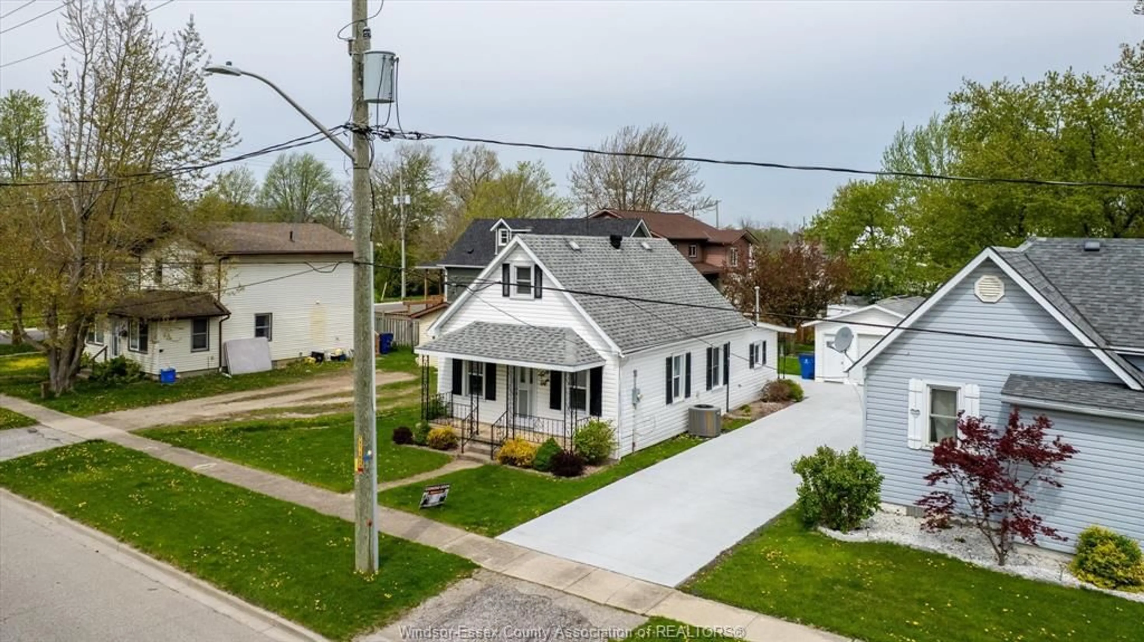 A pic from outside/outdoor area/front of a property/back of a property/a pic from drone, street for 48 CANAL St, Tilbury Ontario N0P 2L0