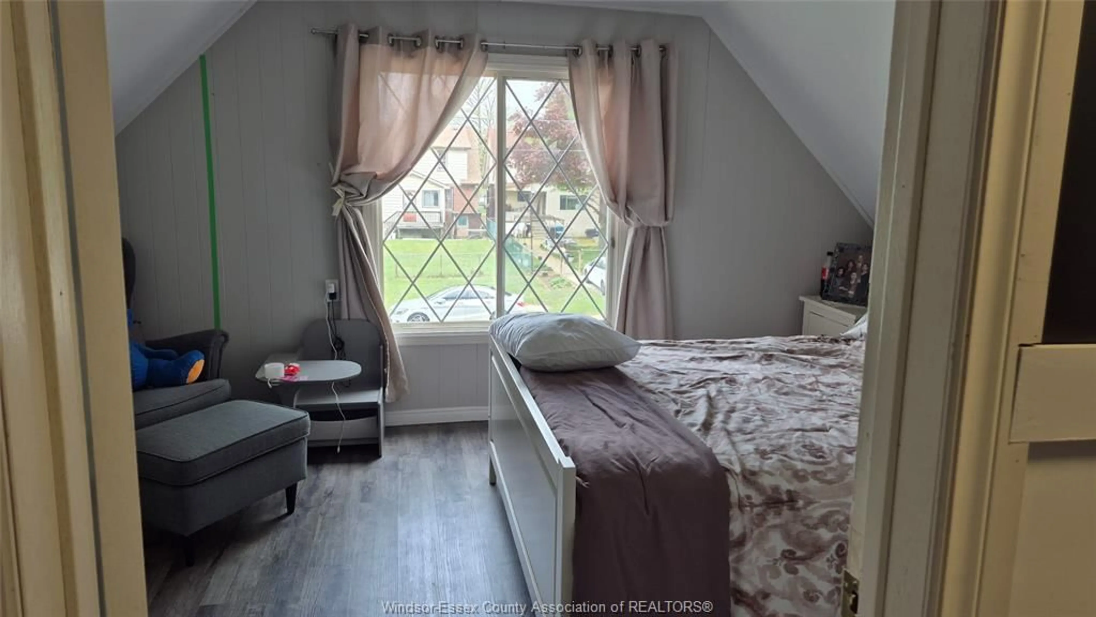 Bedroom with bed, wood/laminate floor for 1045 WELLINGTON, Windsor Ontario N9A 5K2