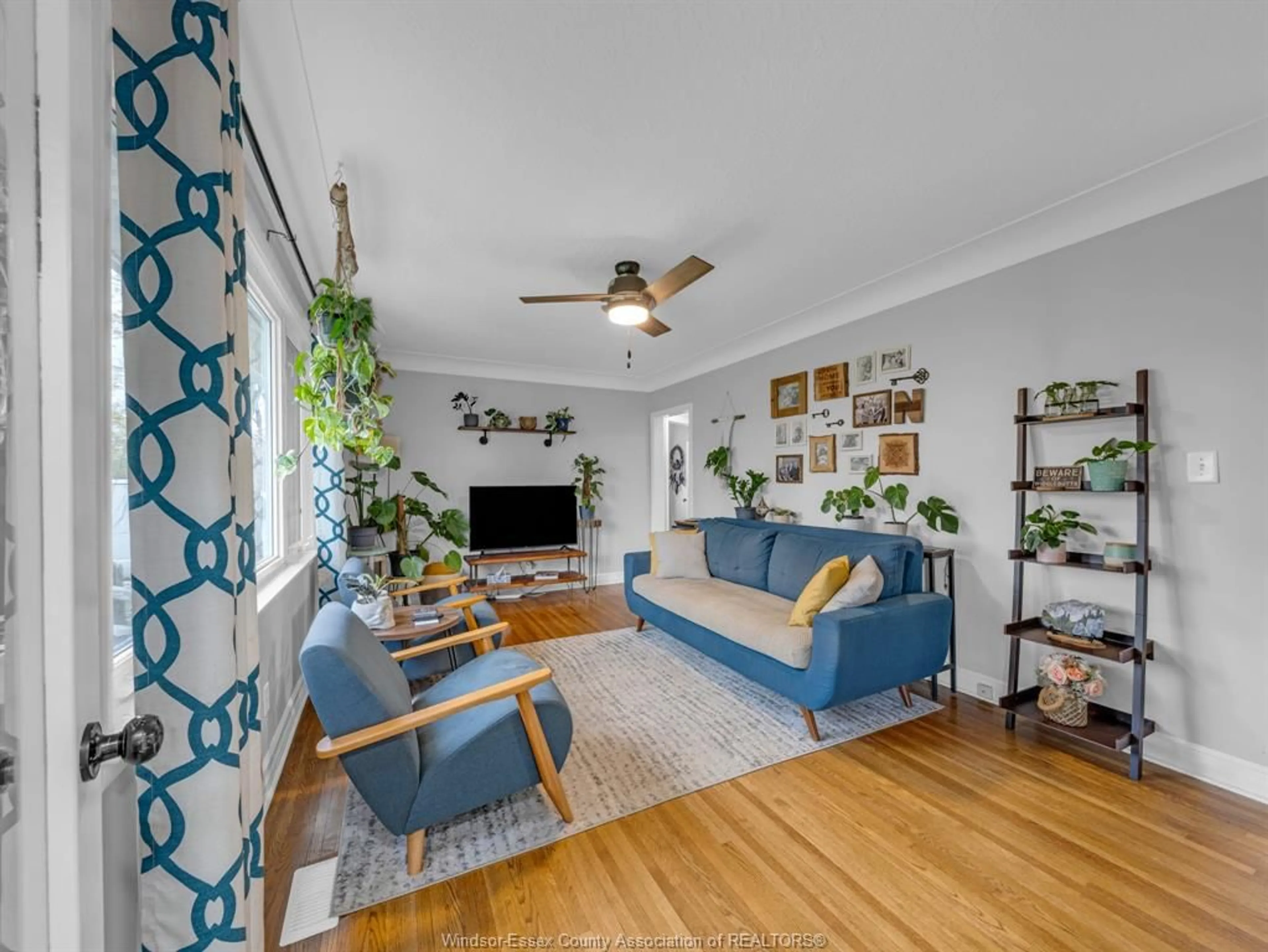 Living room with furniture, wood/laminate floor for 2563 Westminster, Windsor Ontario N8T 1Y2