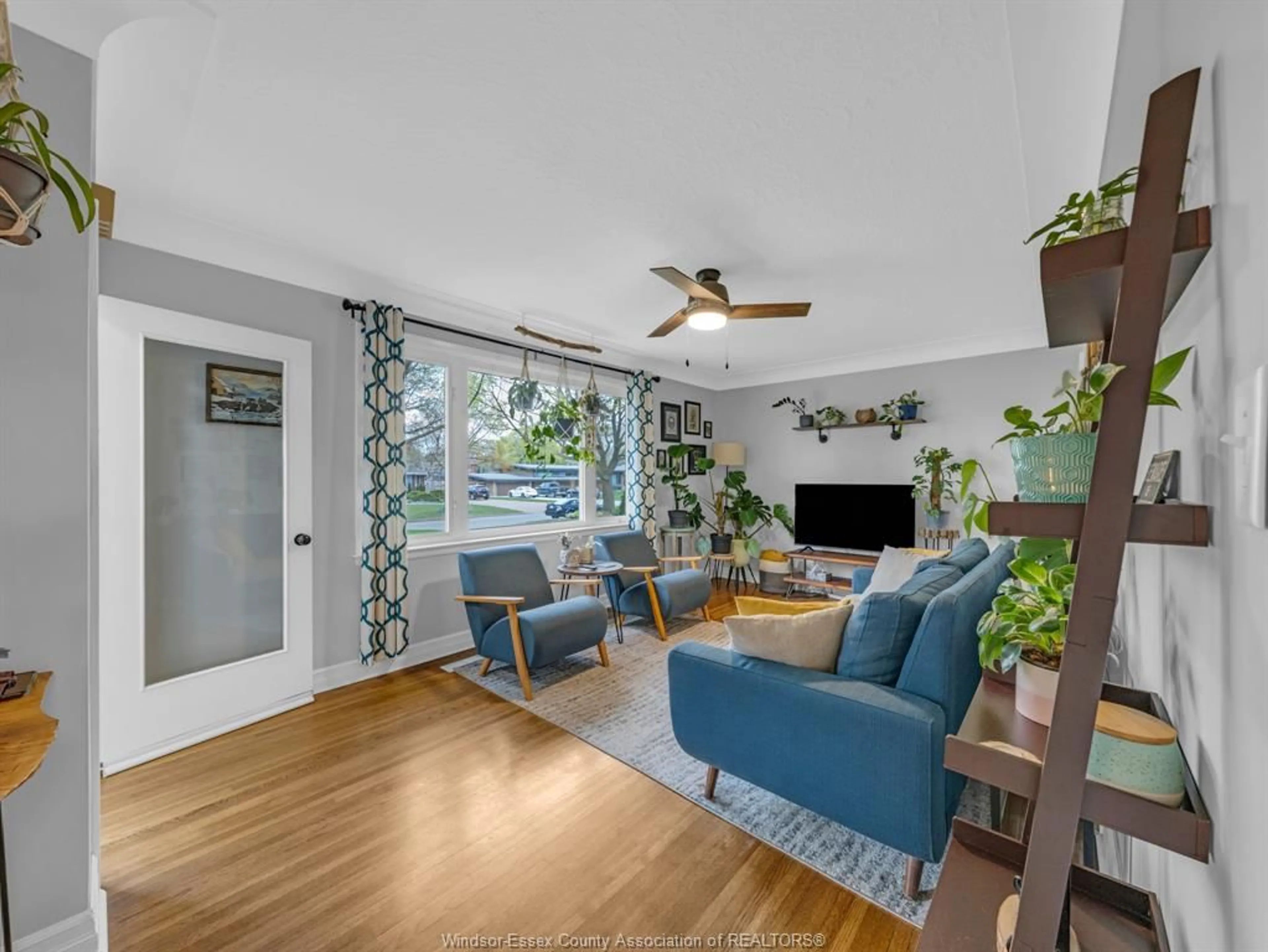 Living room with furniture, wood/laminate floor for 2563 Westminster, Windsor Ontario N8T 1Y2