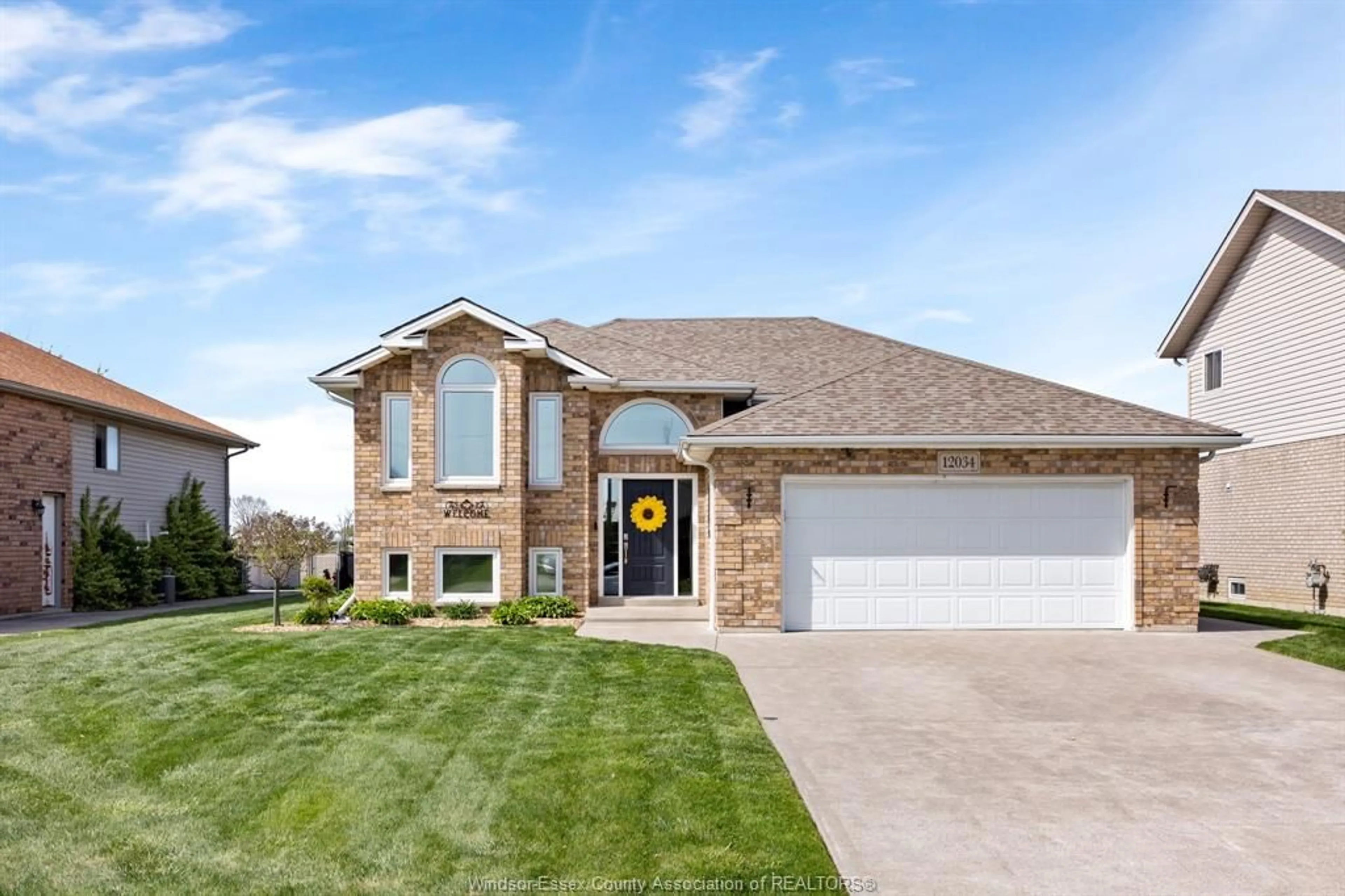 Home with brick exterior material, street for 12034 DUCHARME Lane, Essex Ontario N0R 1J0