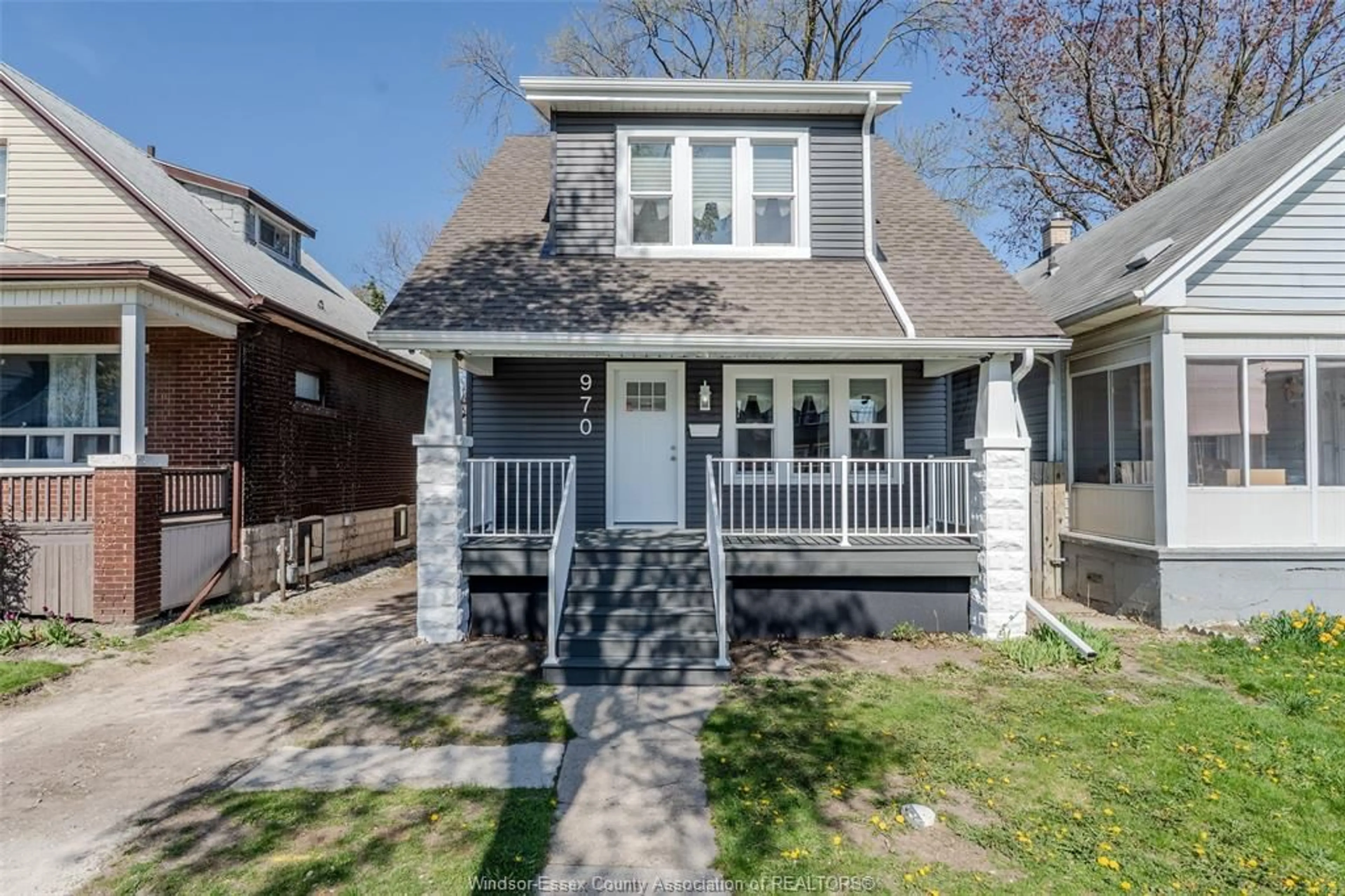Home with vinyl exterior material, street for 970 ELM Ave, Windsor Ontario N9A 5H5