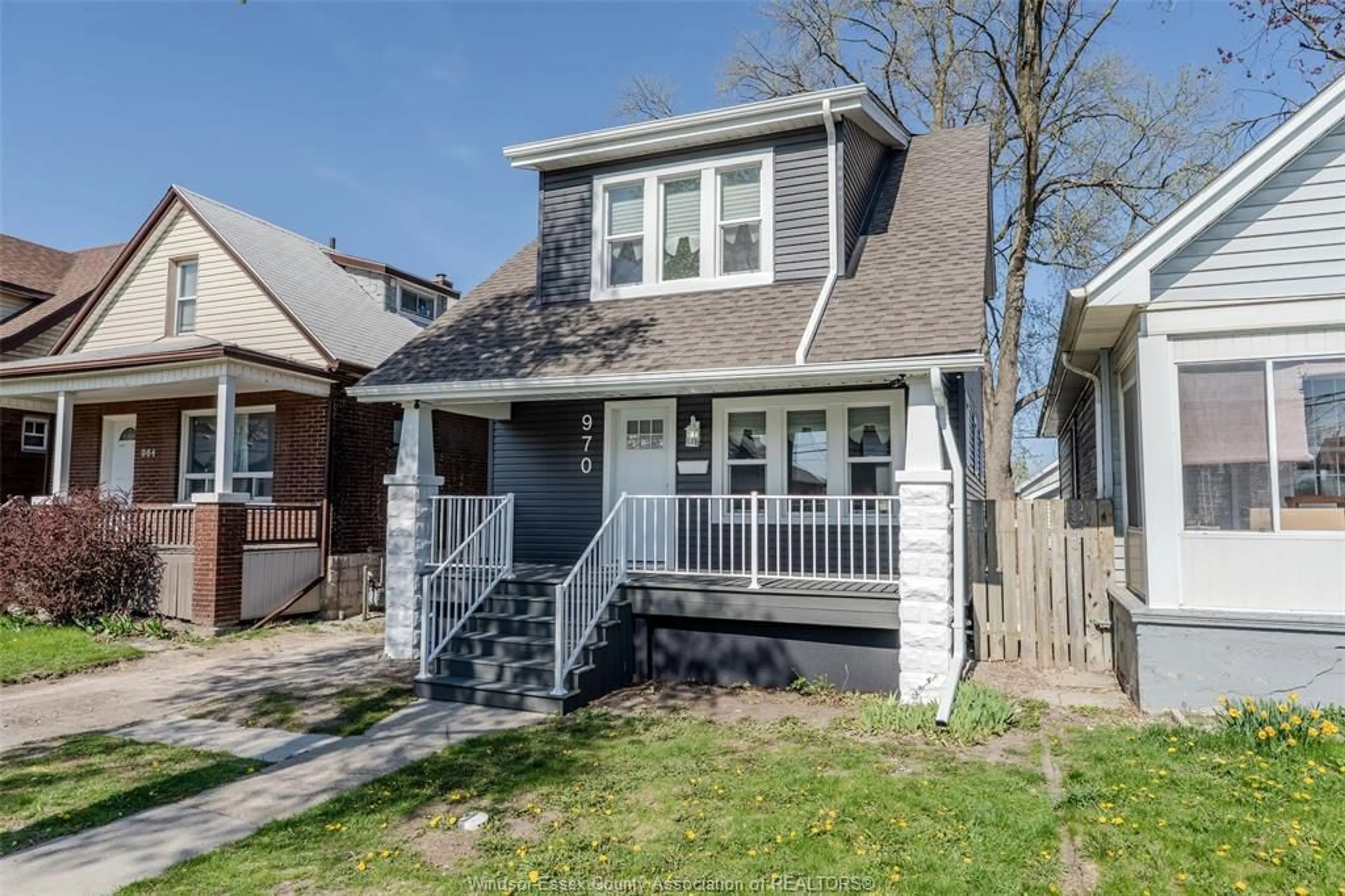 Home with vinyl exterior material, street for 970 ELM Ave, Windsor Ontario N9A 5H5