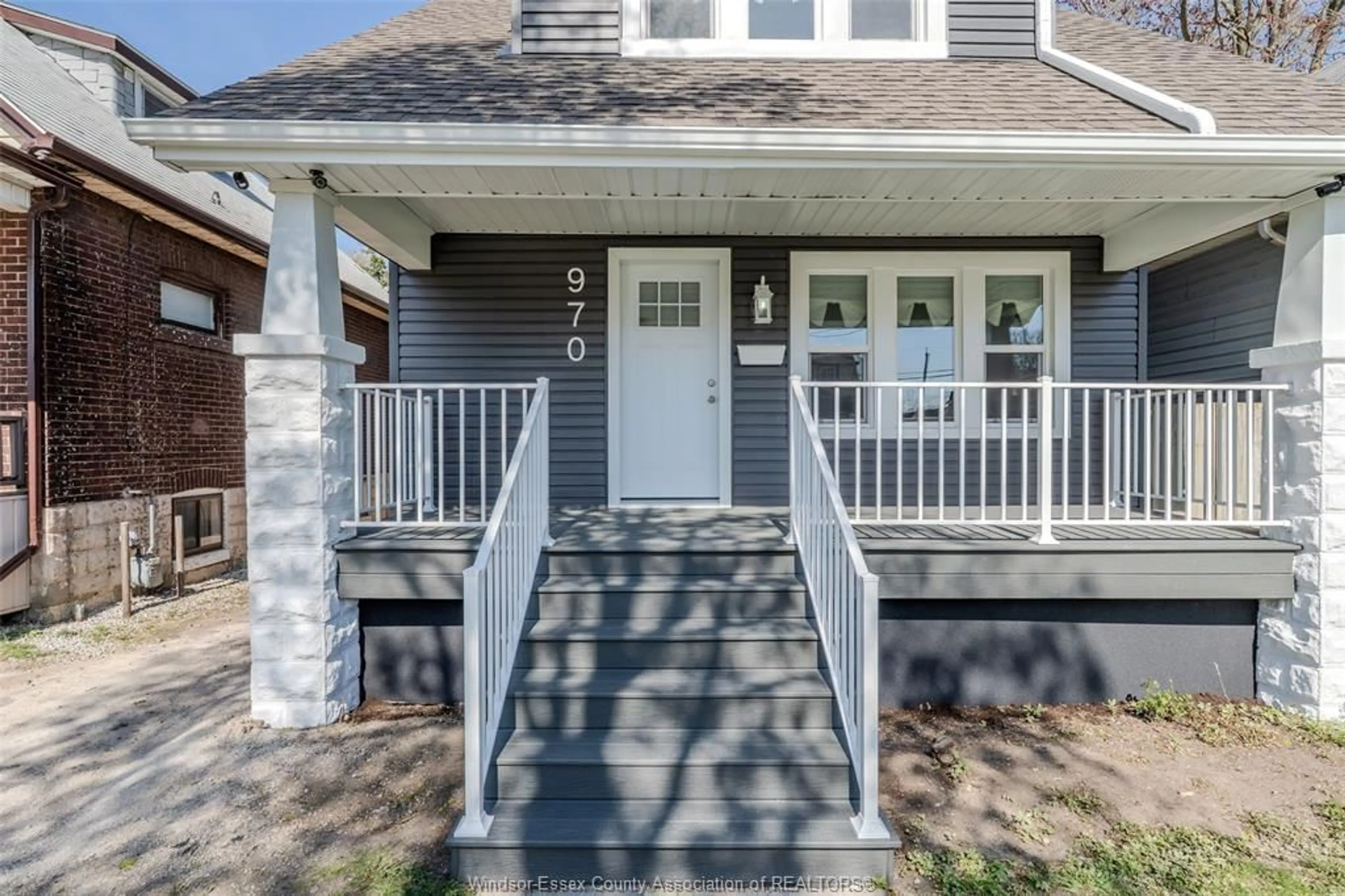 Home with vinyl exterior material, street for 970 ELM Ave, Windsor Ontario N9A 5H5