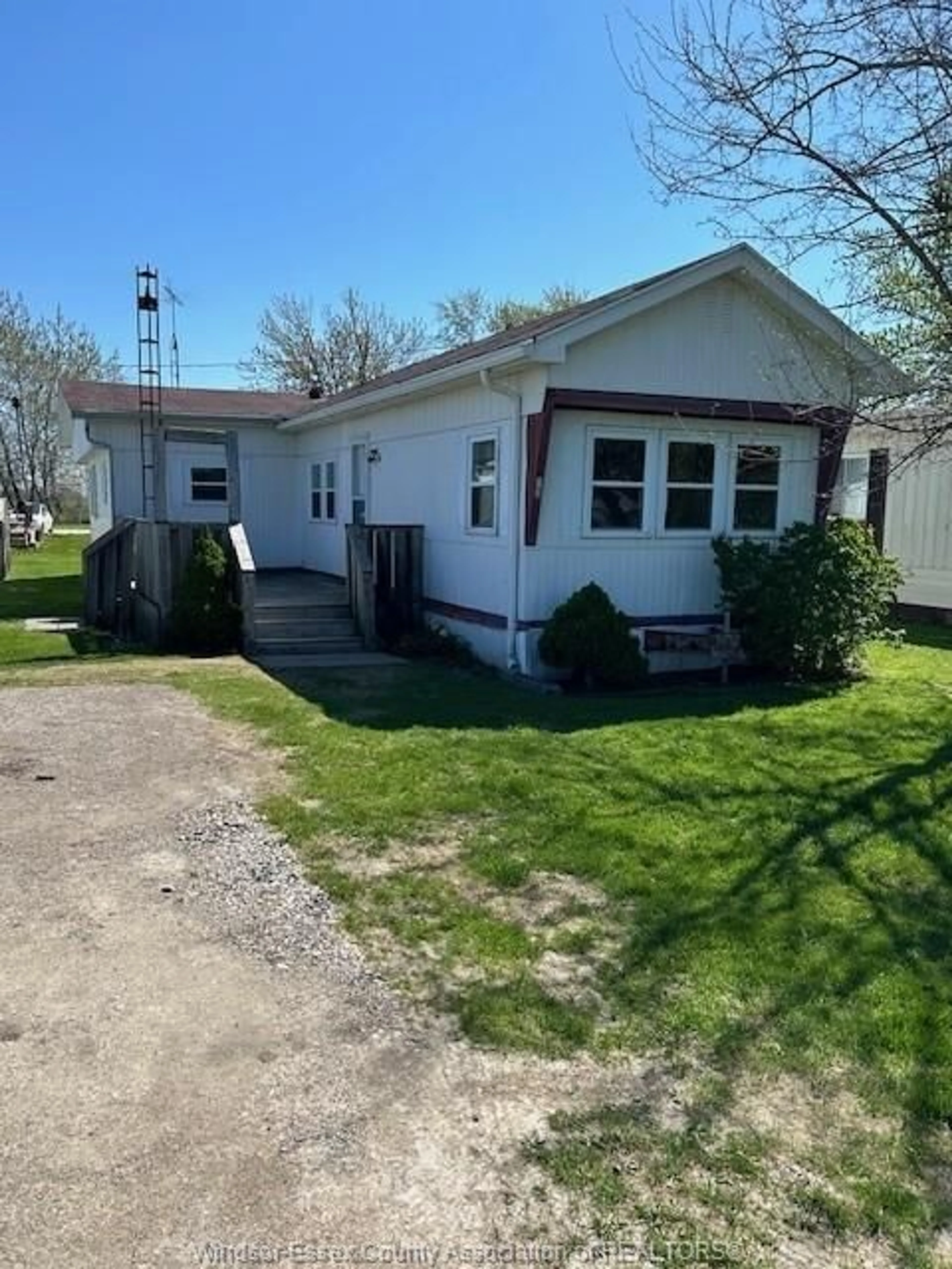 Home with vinyl exterior material, street for 11408 COUNTY RD 46 #13, Lakeshore Ontario N0P 1J0