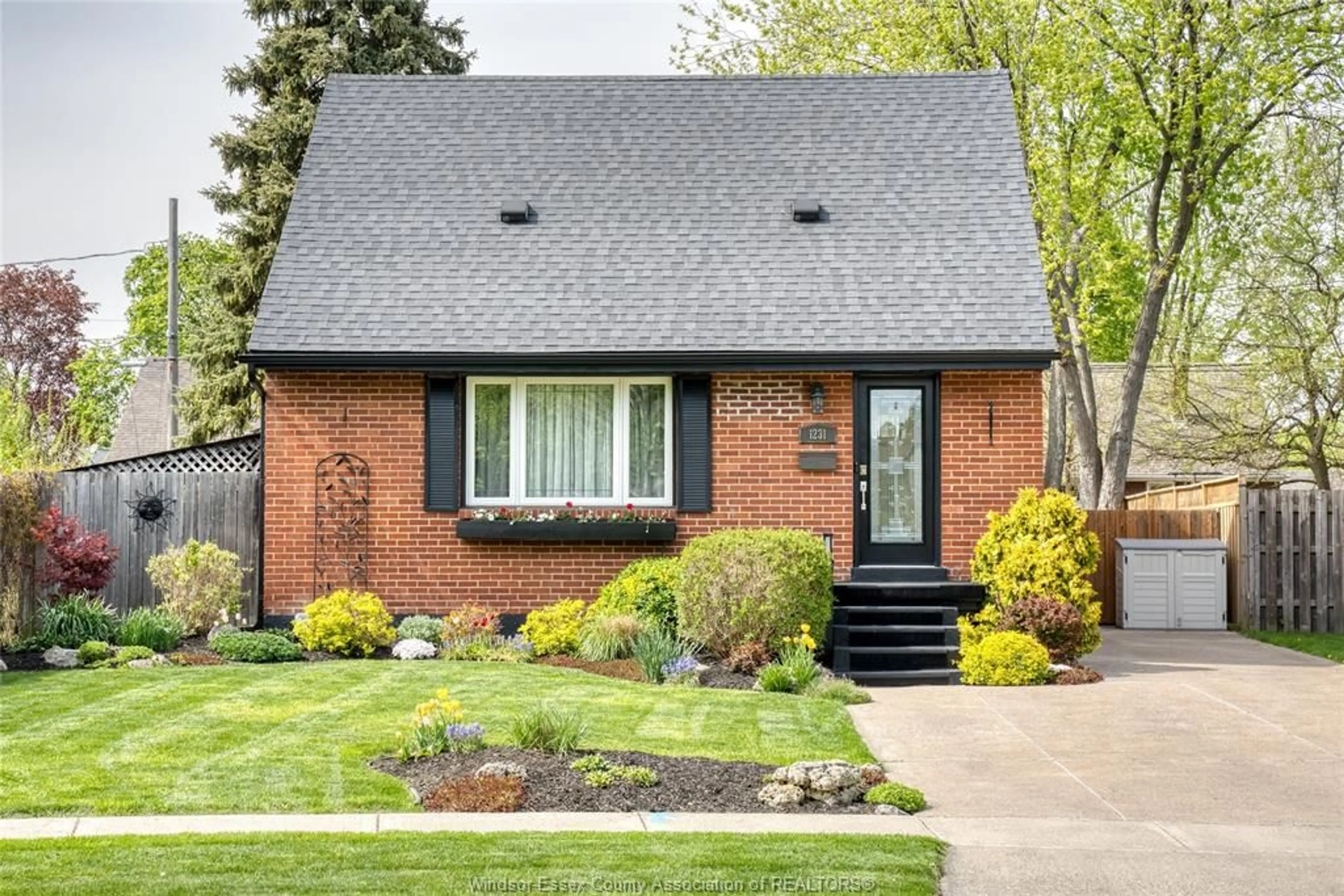 Home with brick exterior material, street for 1231 TILSTON, Windsor Ontario N9B 3C6