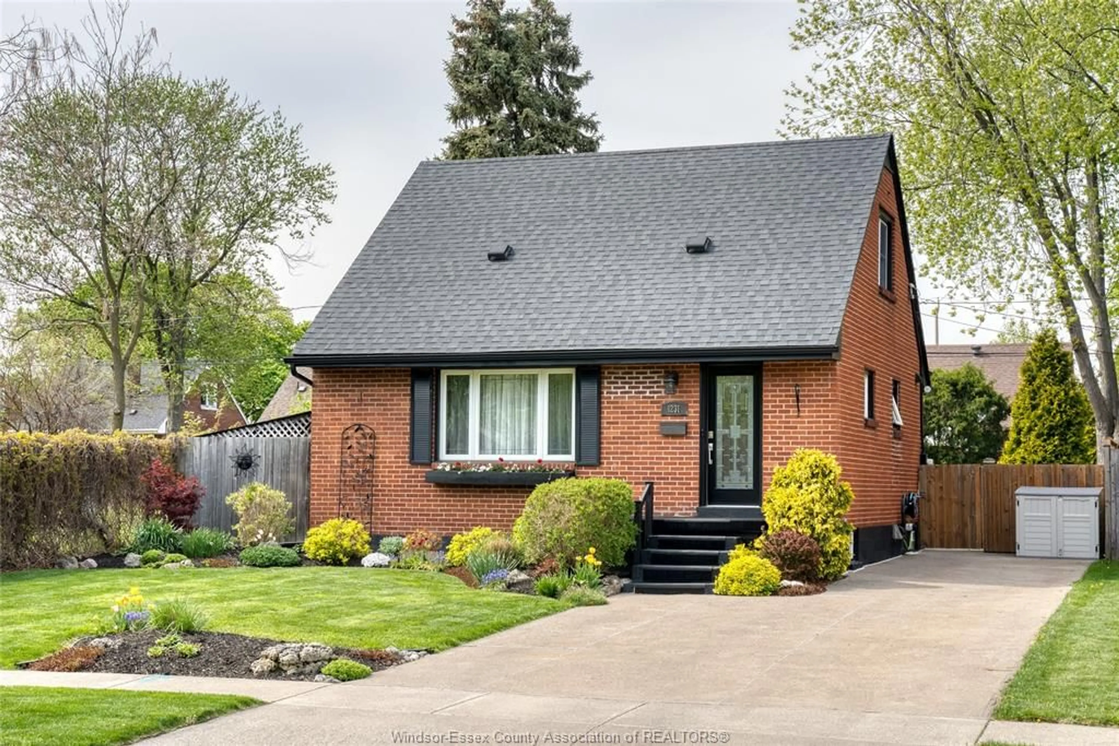 Home with brick exterior material, street for 1231 TILSTON, Windsor Ontario N9B 3C6