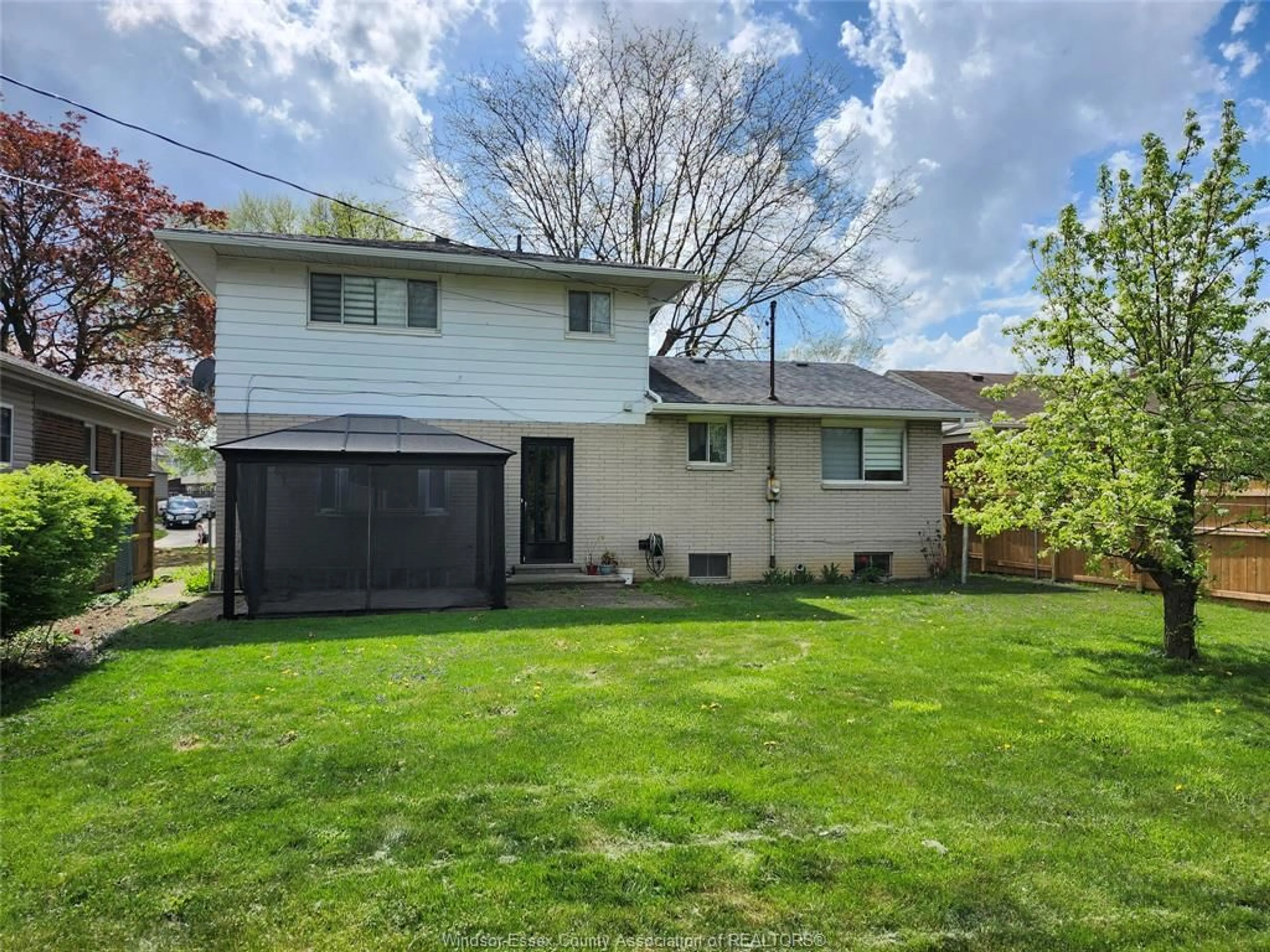 Home with vinyl exterior material, street for 2568 NORMAN Rd, Windsor Ontario N8T 1S7