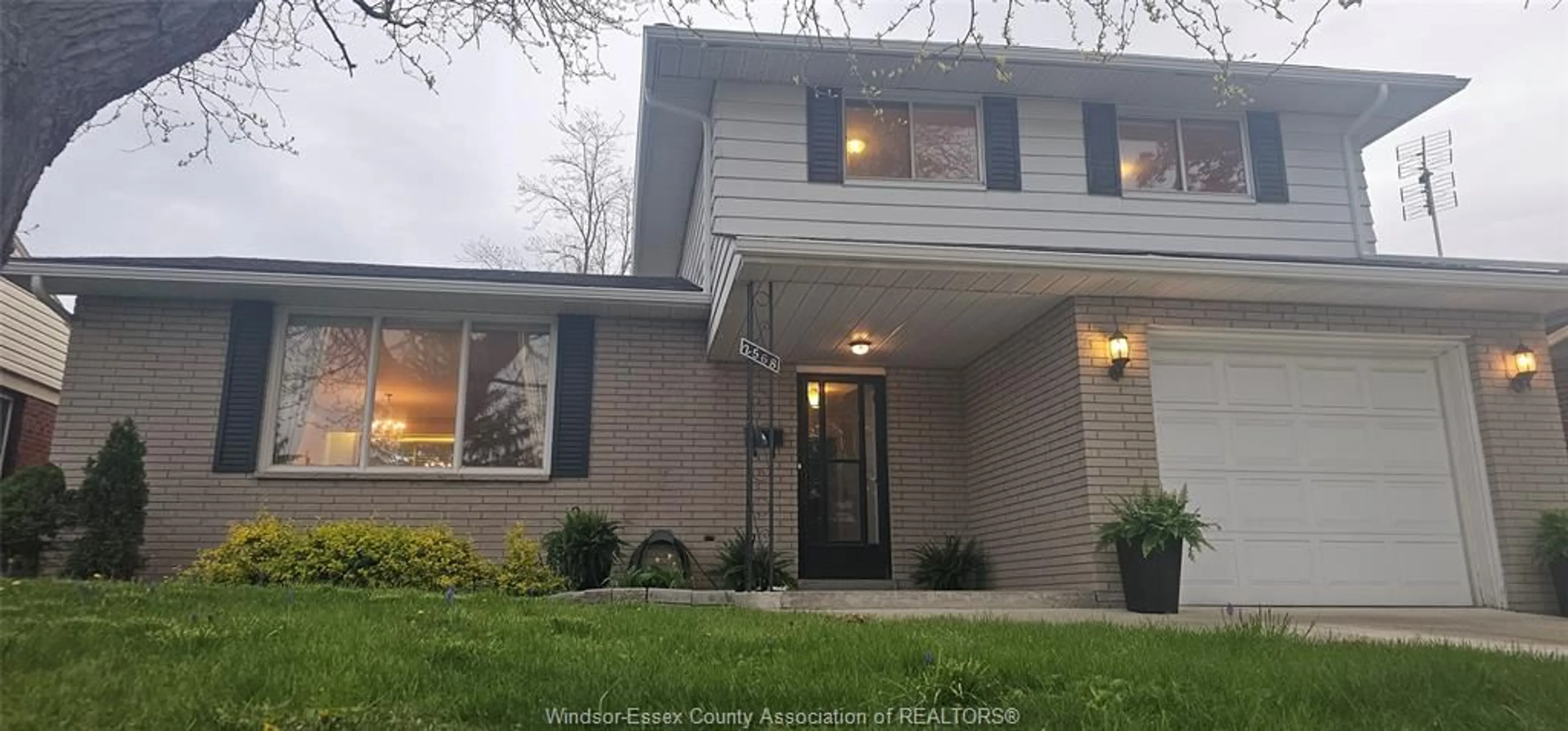 Home with vinyl exterior material, street for 2568 NORMAN Rd, Windsor Ontario N8T 1S7