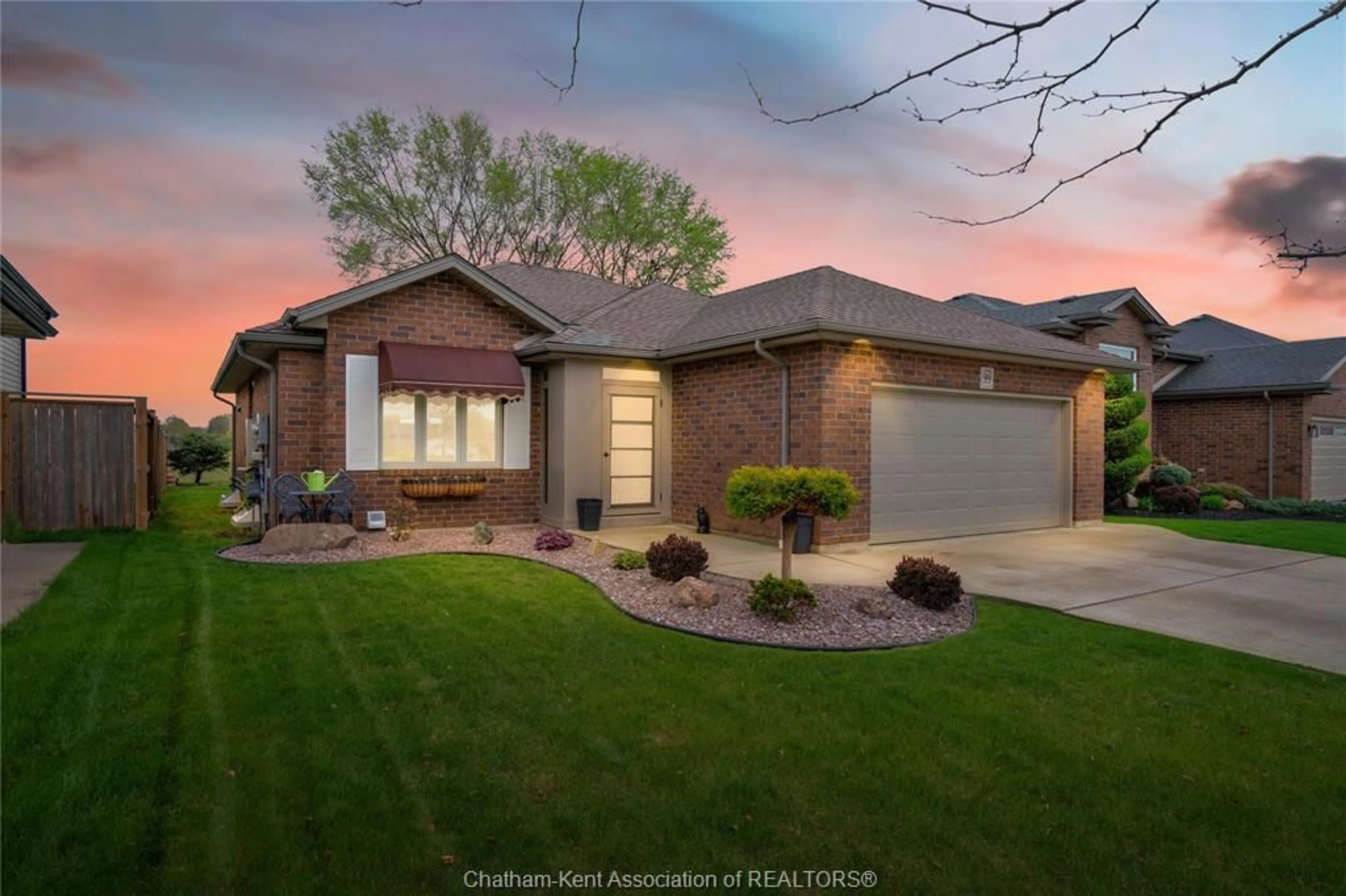 Home with brick exterior material, street for 99 Golfview Dr, Kingsville Ontario N9Y 0A6