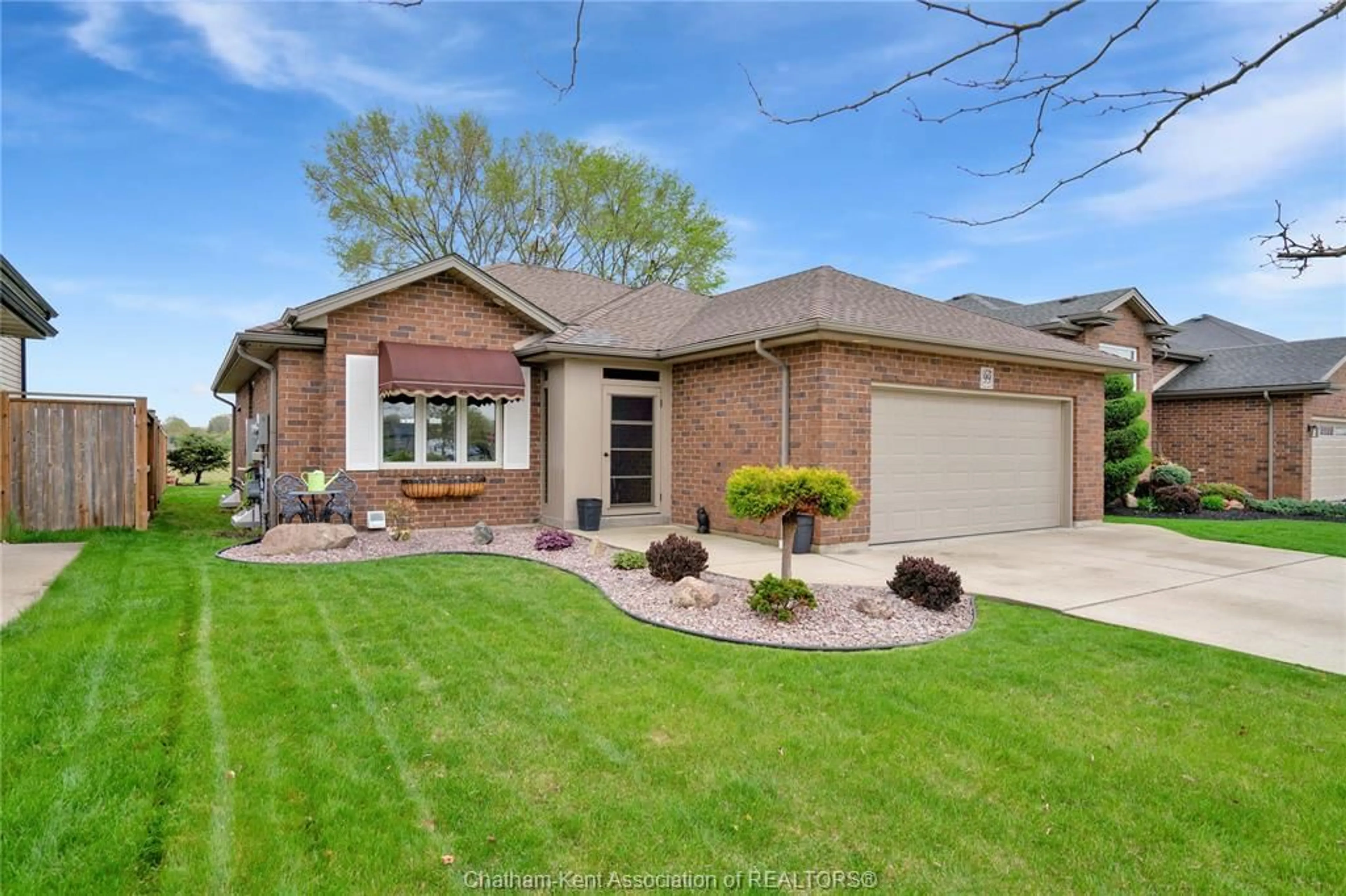Home with brick exterior material, street for 99 Golfview Dr, Kingsville Ontario N9Y 0A6