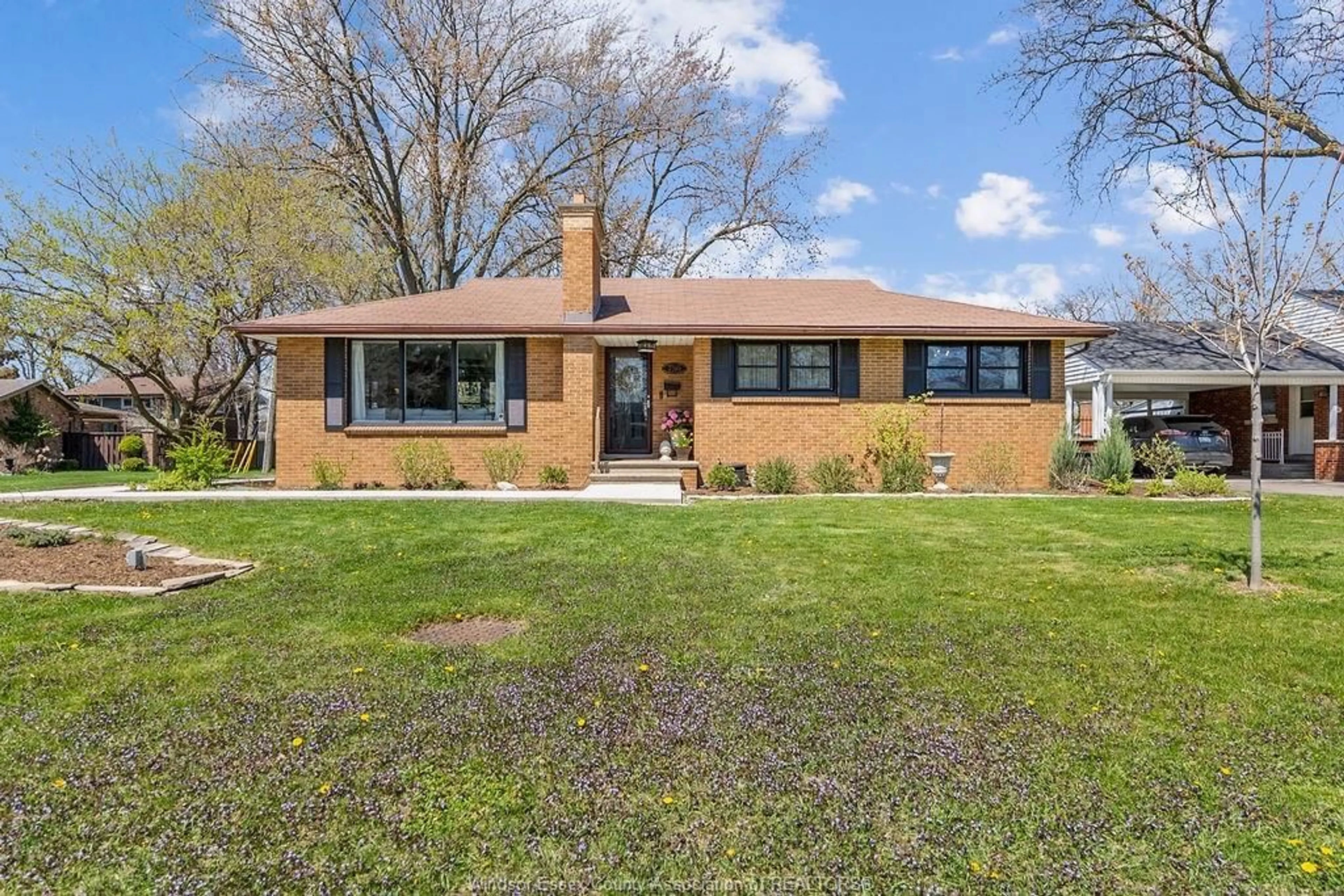 Home with brick exterior material, street for 750 CARTIER Dr, Windsor Ontario N9E 1N4