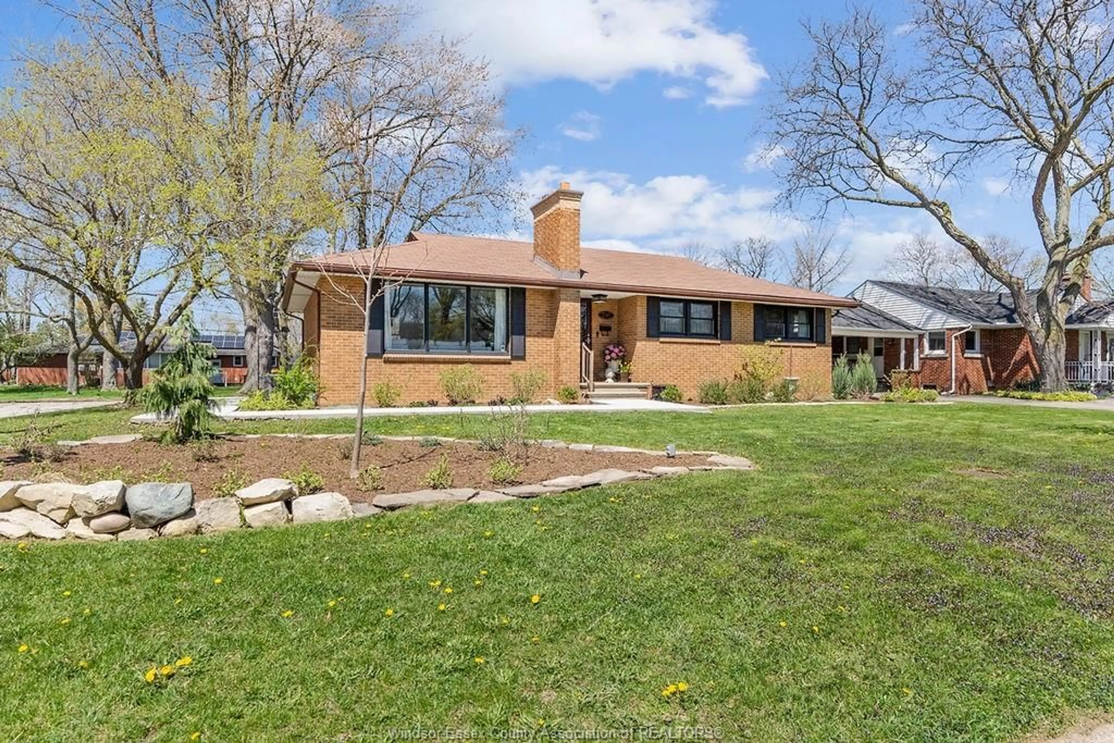 Home with brick exterior material, street for 750 CARTIER Dr, Windsor Ontario N9E 1N4