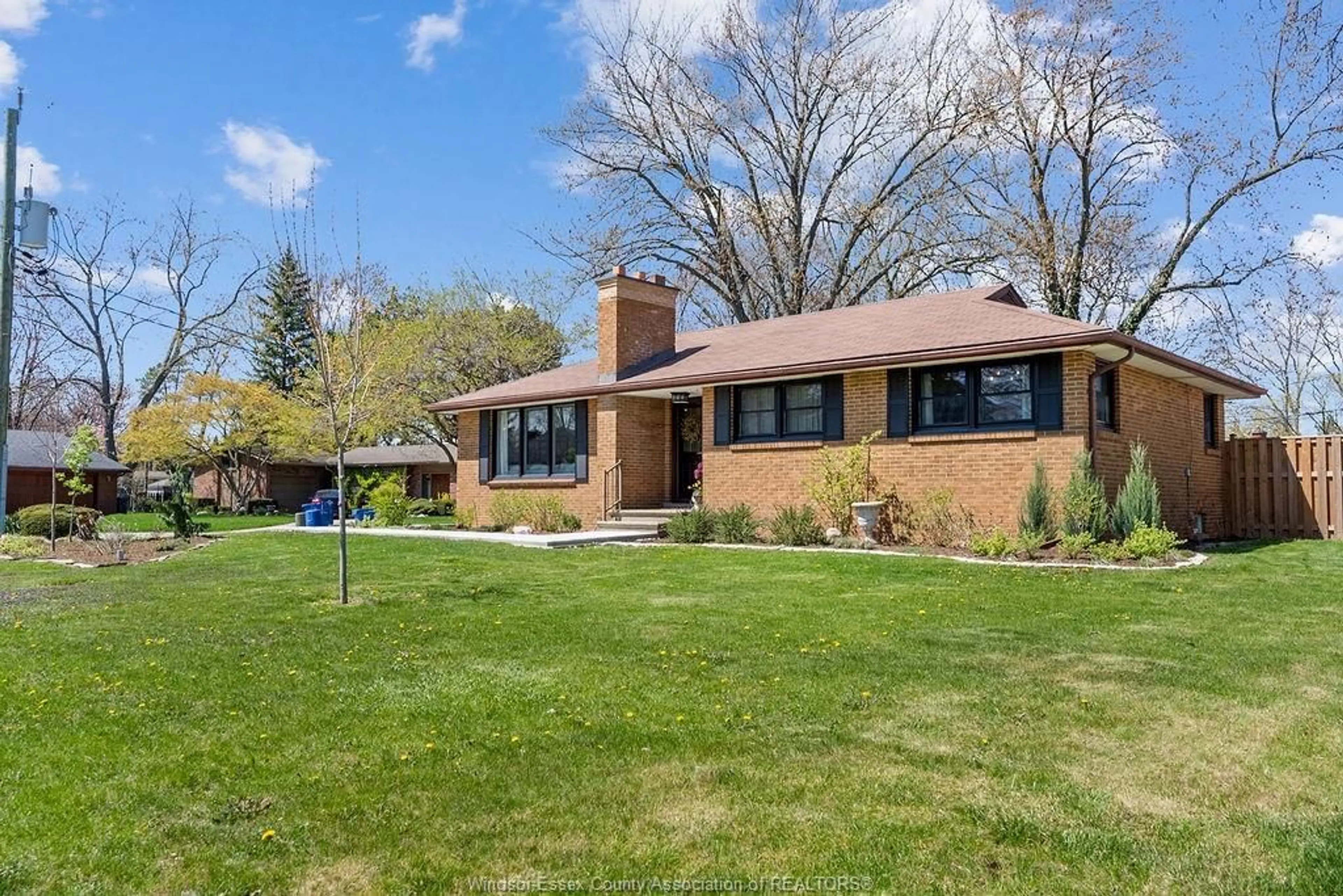 Home with brick exterior material, street for 750 CARTIER Dr, Windsor Ontario N9E 1N4