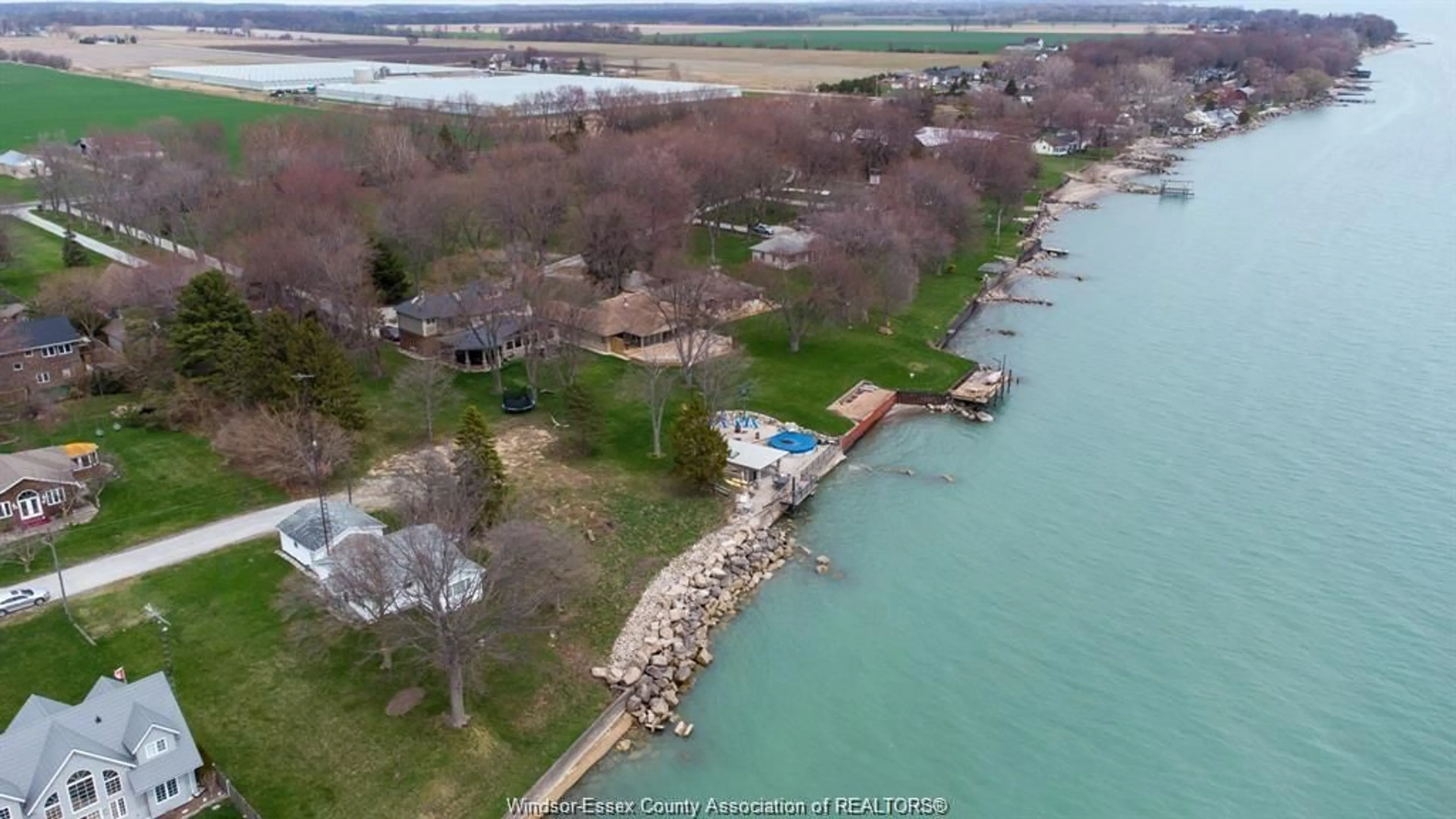 A pic from outside/outdoor area/front of a property/back of a property/a pic from drone, water/lake/river/ocean view for 983 WATERS BEACH, Colchester Ontario N0R 1G0