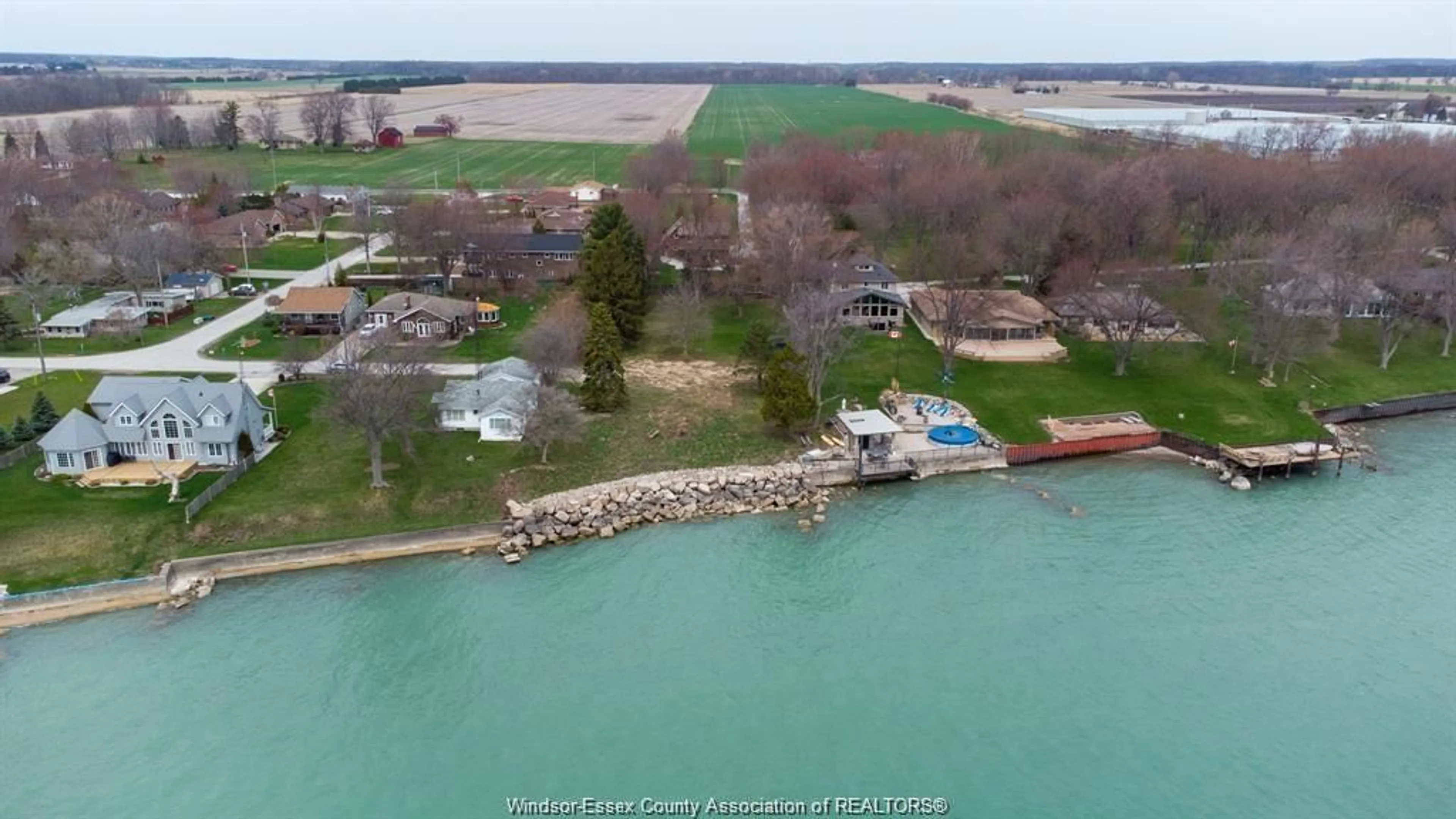A pic from outside/outdoor area/front of a property/back of a property/a pic from drone, water/lake/river/ocean view for 983 WATERS BEACH, Colchester Ontario N0R 1G0