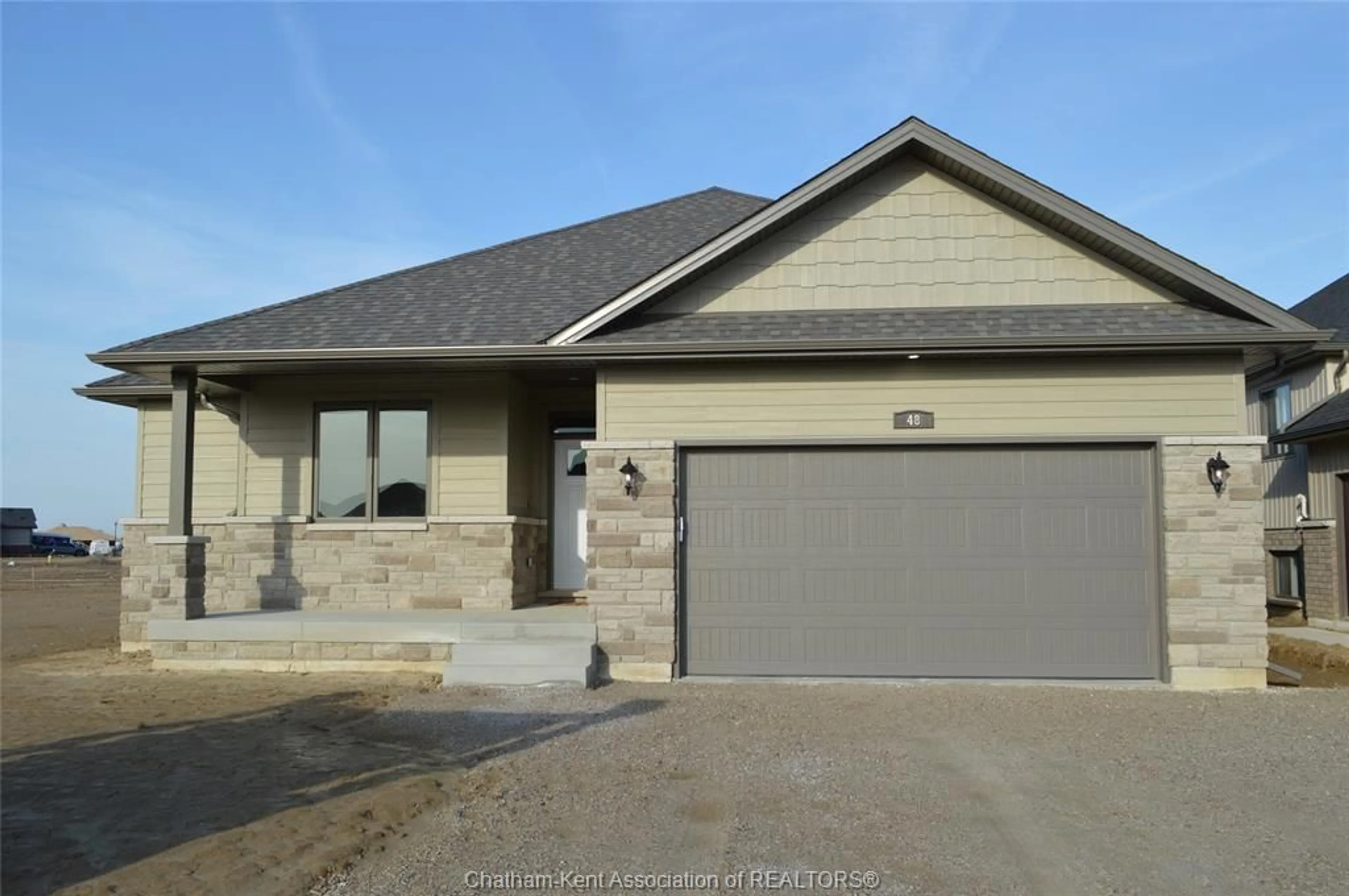 Home with brick exterior material, street for 48 Cherry Blossom Trail, Chatham Ontario N7L 0H1