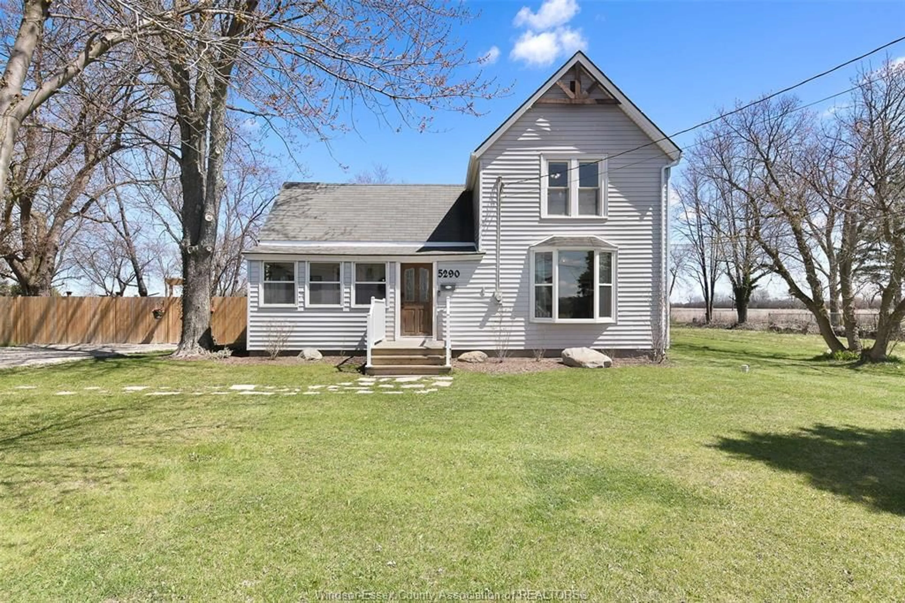 A pic from outside/outdoor area/front of a property/back of a property/a pic from drone, street for 5290 Huron Church Line Rd, LaSalle Ontario N9H 1H6