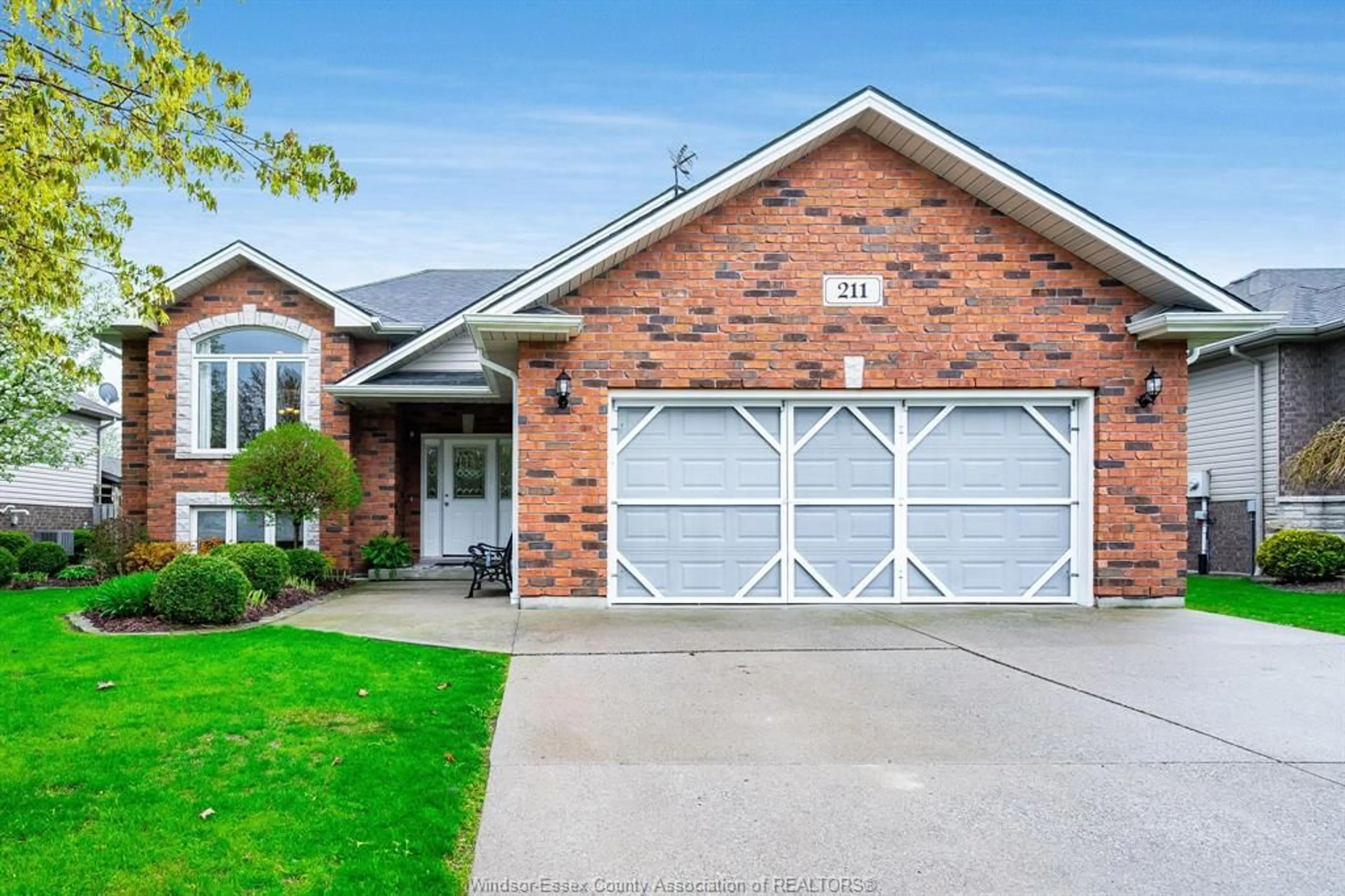 Home with brick exterior material, street for 211 Dieppe Cres, Kingsville Ontario N9Y 4B9