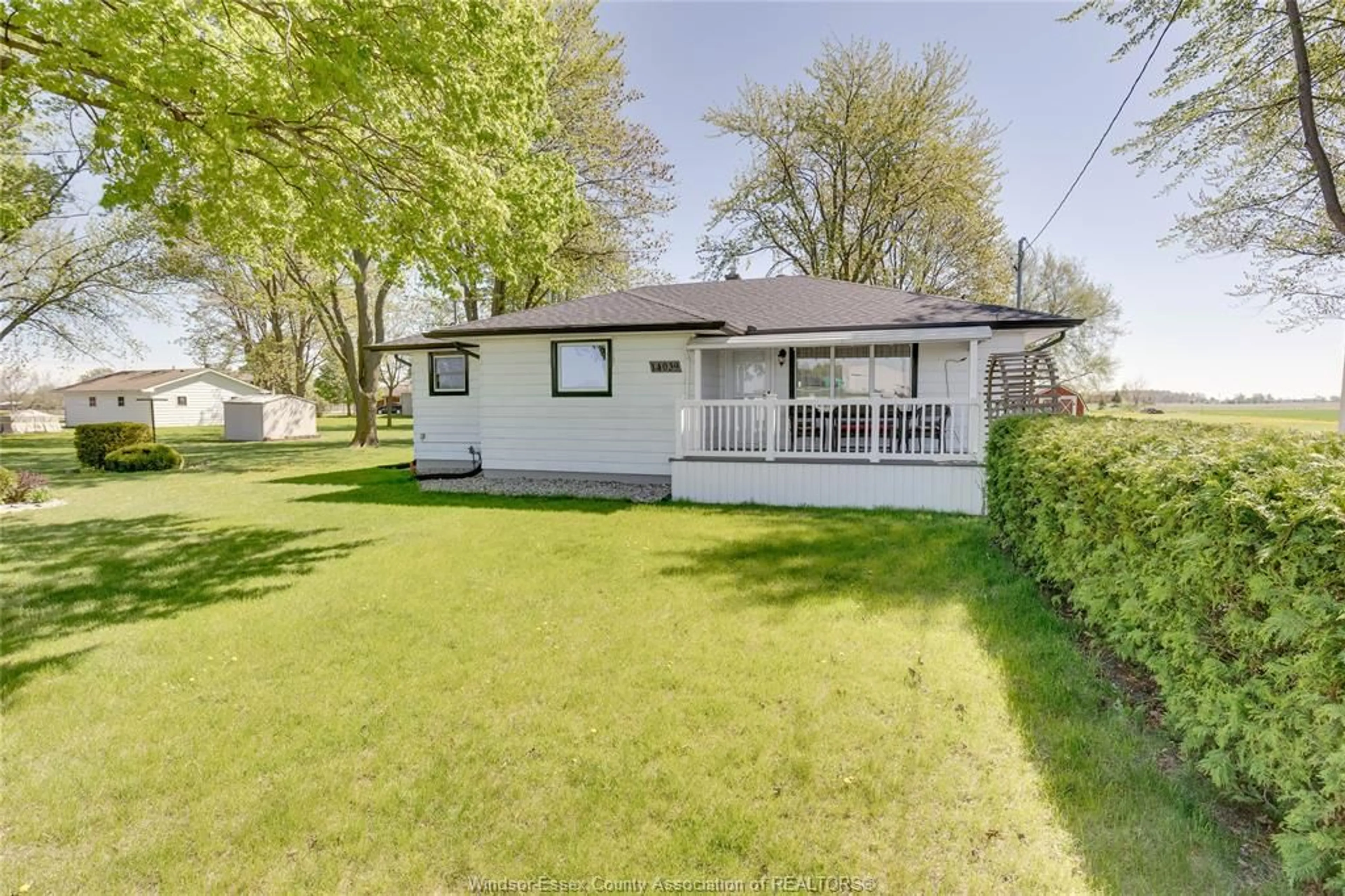 A pic from outside/outdoor area/front of a property/back of a property/a pic from drone, street for 14039 WALKER Rd, Essex Ontario N8M 2X6