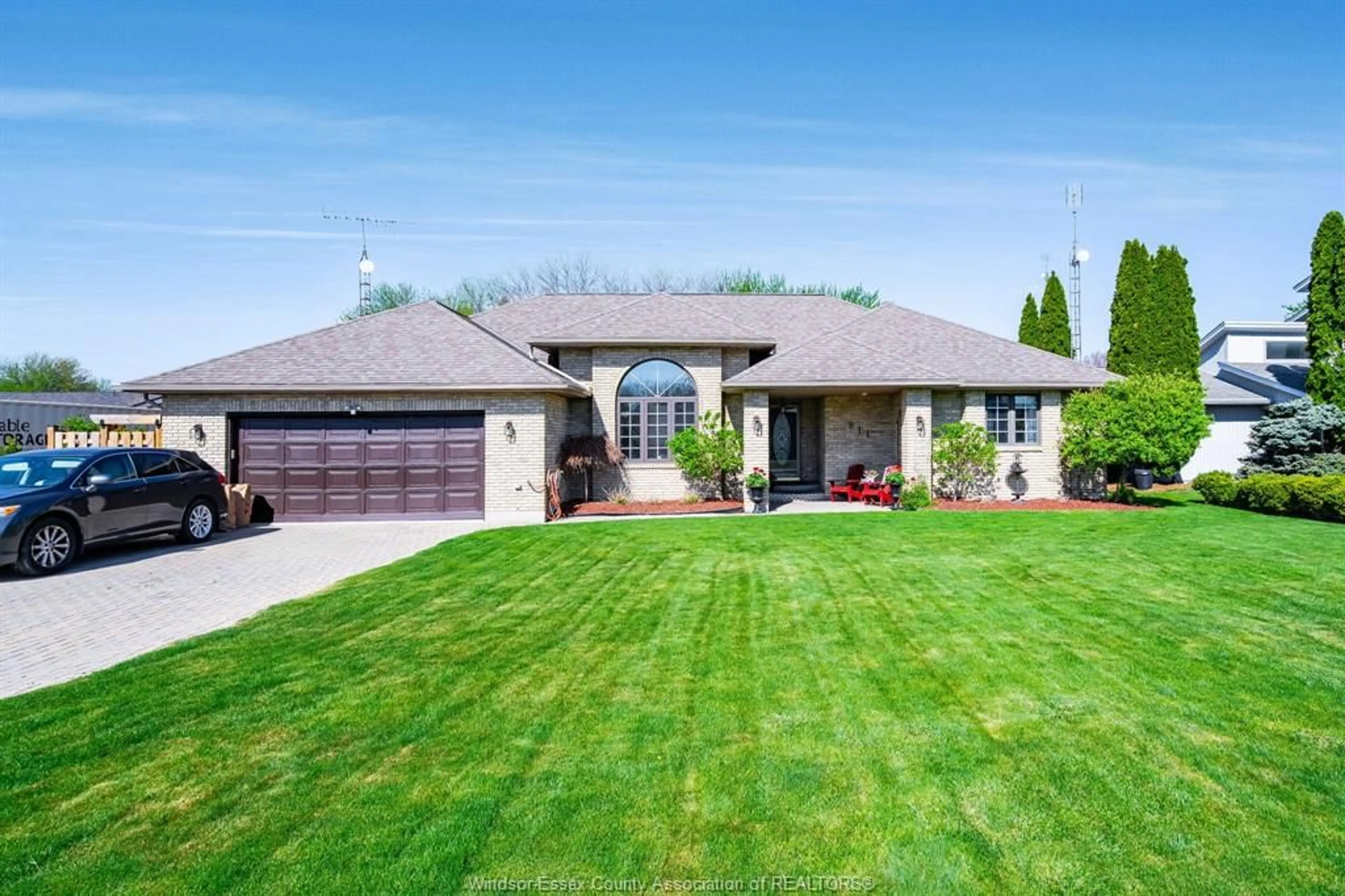 Home with brick exterior material, street for 811 RIVAIT Dr, Lakeshore Ontario N0P 2L0