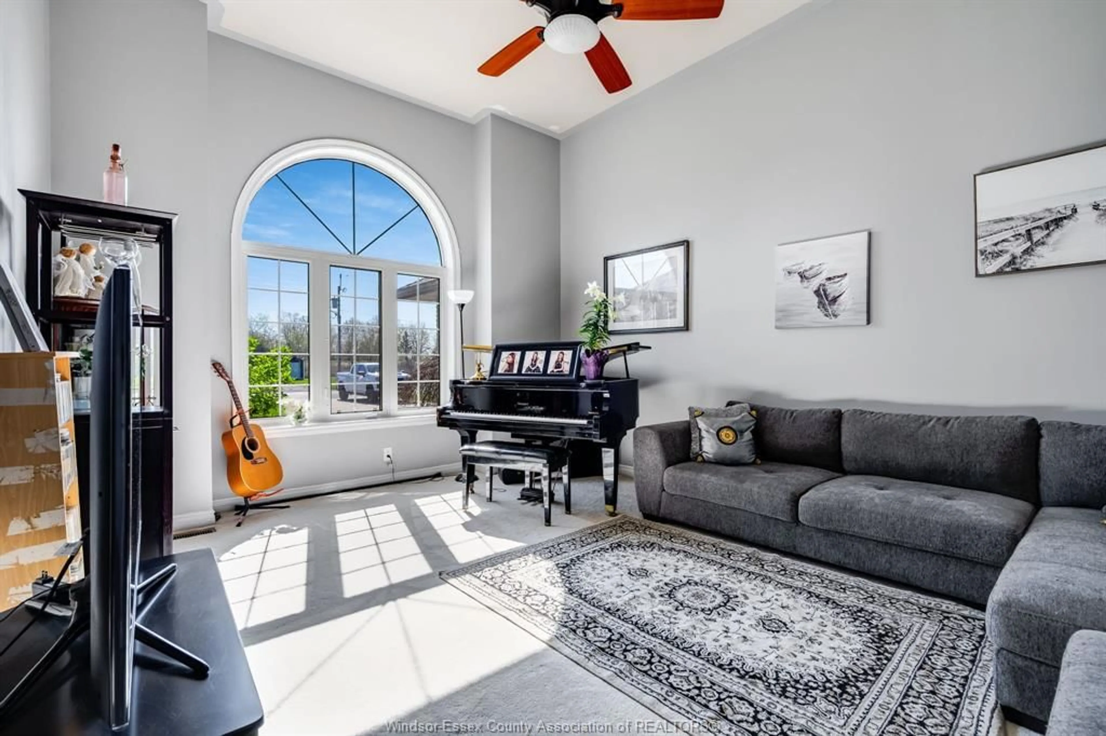 Living room with furniture, ceramic/tile floor for 811 RIVAIT Dr, Lakeshore Ontario N0P 2L0