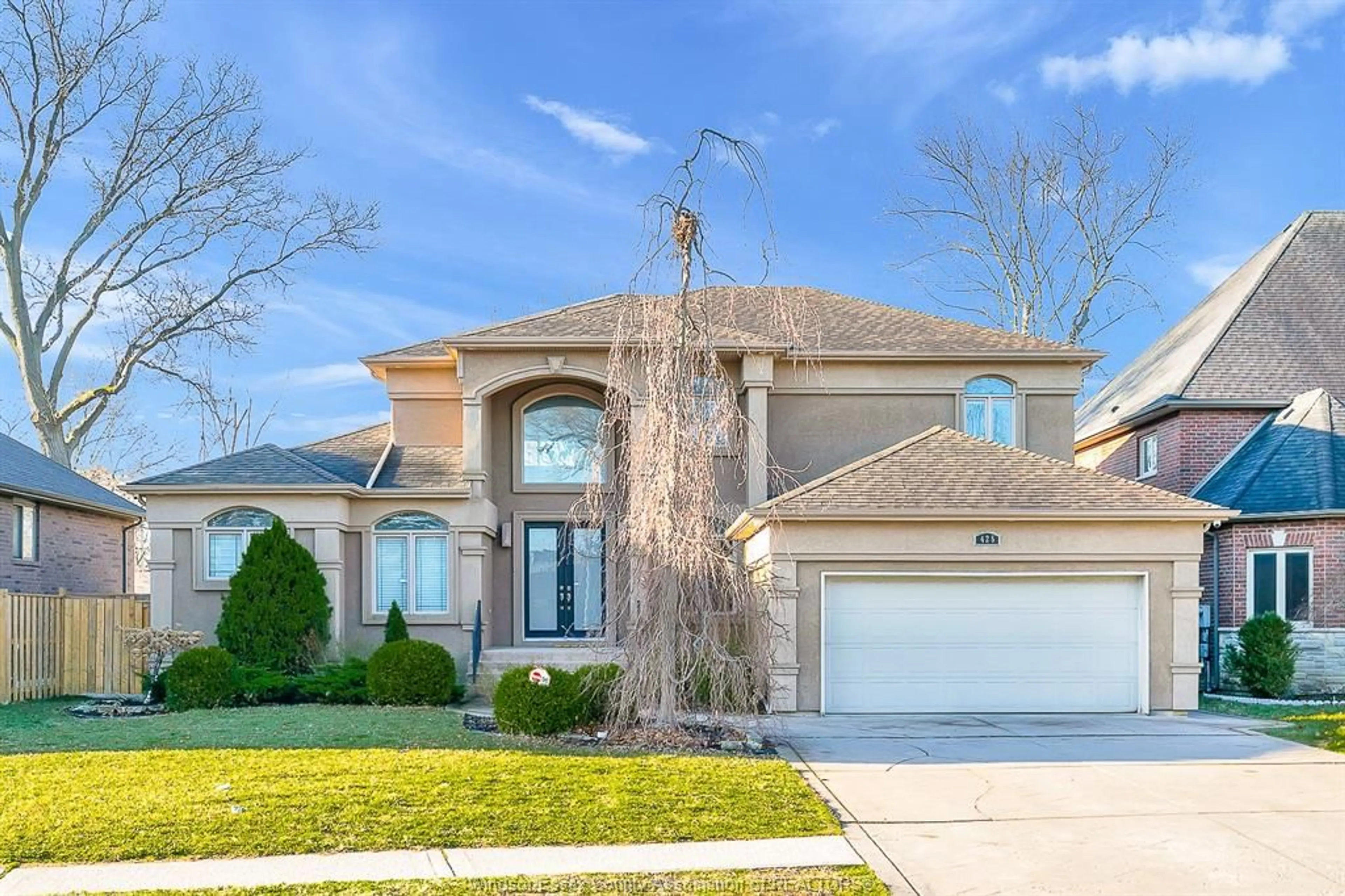 Home with brick exterior material, street for 425 COUNTRY CLUB Dr, Windsor Ontario N9G 3G9