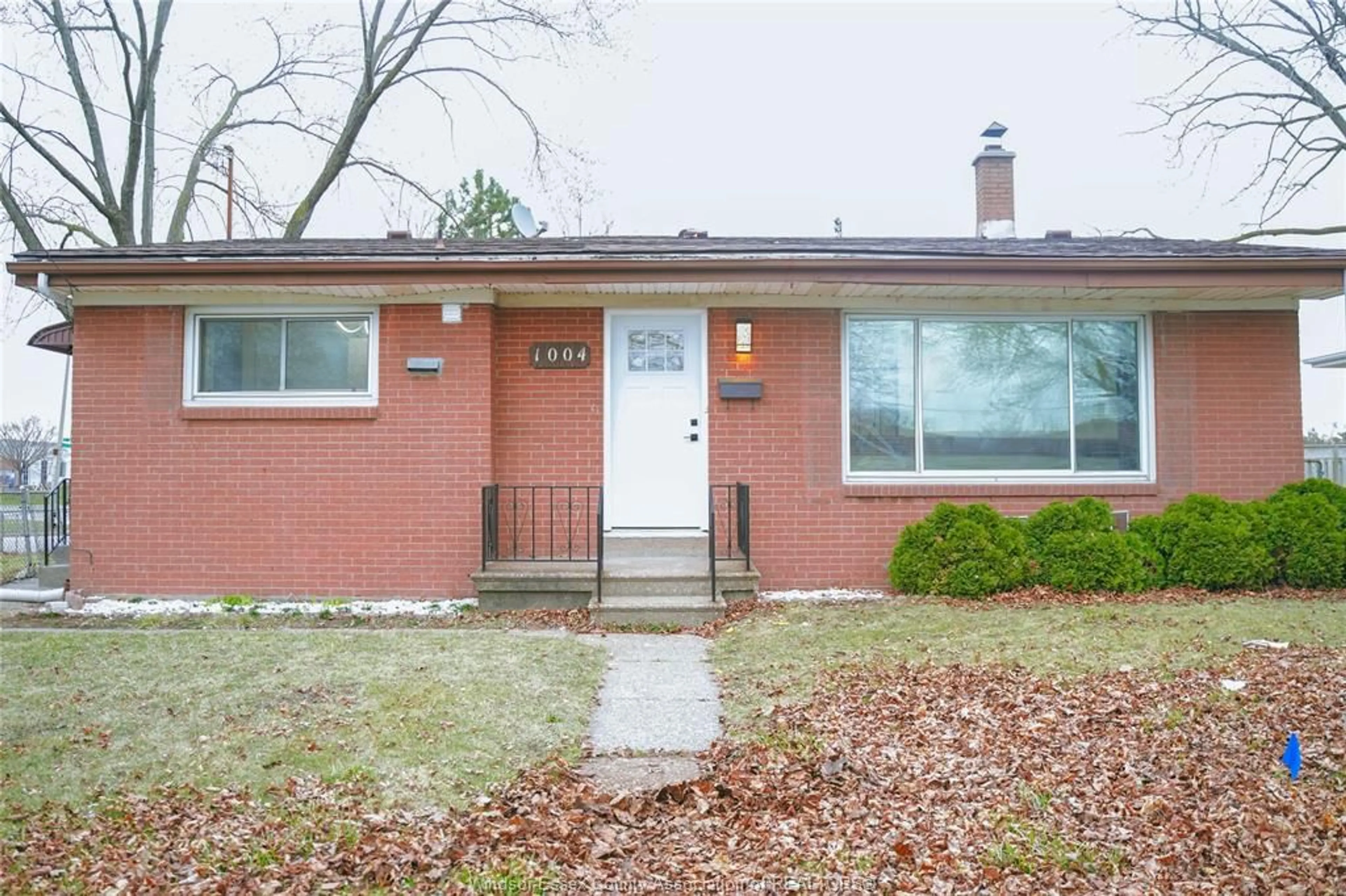 Home with brick exterior material, street for 1004 DOT Ave, Windsor Ontario N9C 3H8