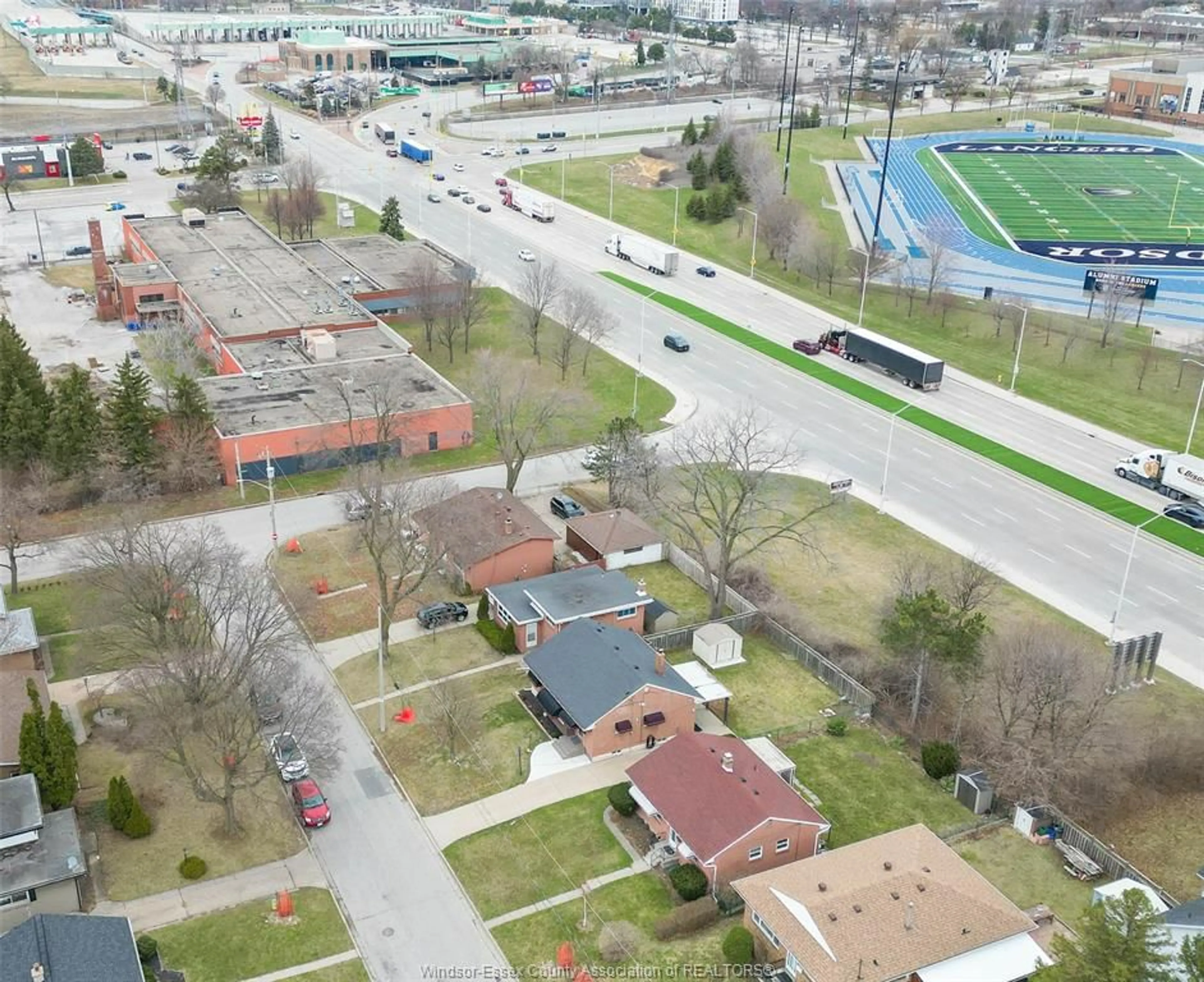 A pic from outside/outdoor area/front of a property/back of a property/a pic from drone, street for 1004 DOT Ave, Windsor Ontario N9C 3H8