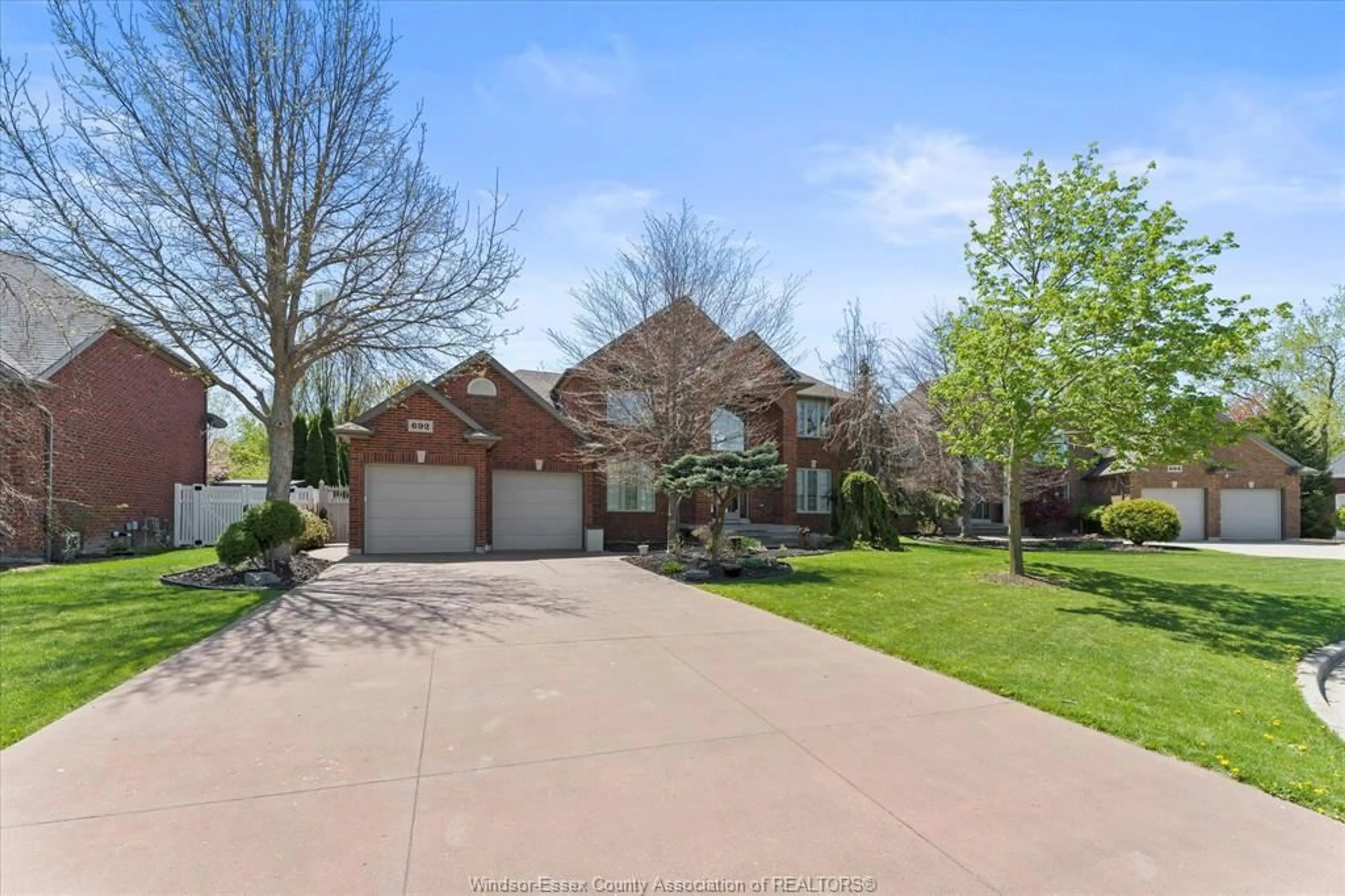 A pic from outside/outdoor area/front of a property/back of a property/a pic from drone, street for 692 GEORGE KENNEDY Way, Lakeshore Ontario N0R 1A0